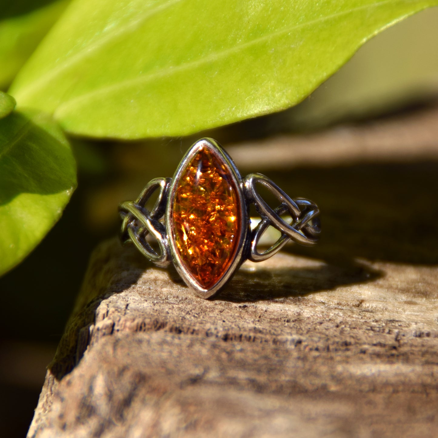 Ring with triskel created in natural cognac-colored Amber and 925 Sterling Silver, MJ Baltica, BP002