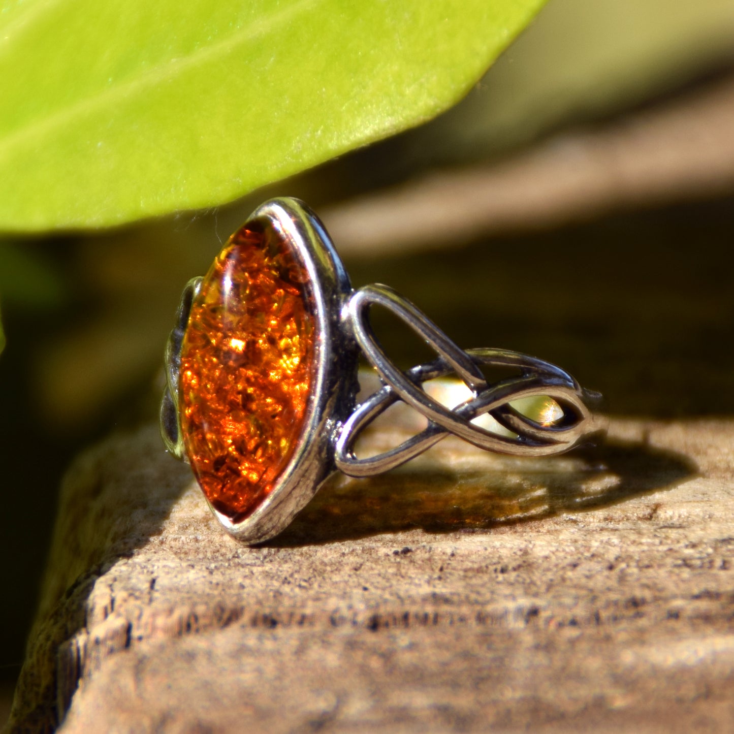 Ring with triskel created in natural cognac-colored Amber and 925 Sterling Silver, MJ Baltica, BP002