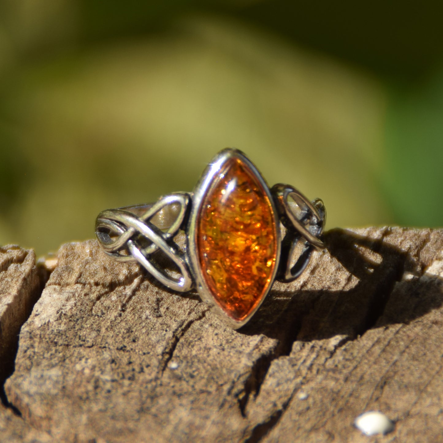 Ring with triskel created in natural cognac-colored Amber and 925 Sterling Silver, MJ Baltica, BP002
