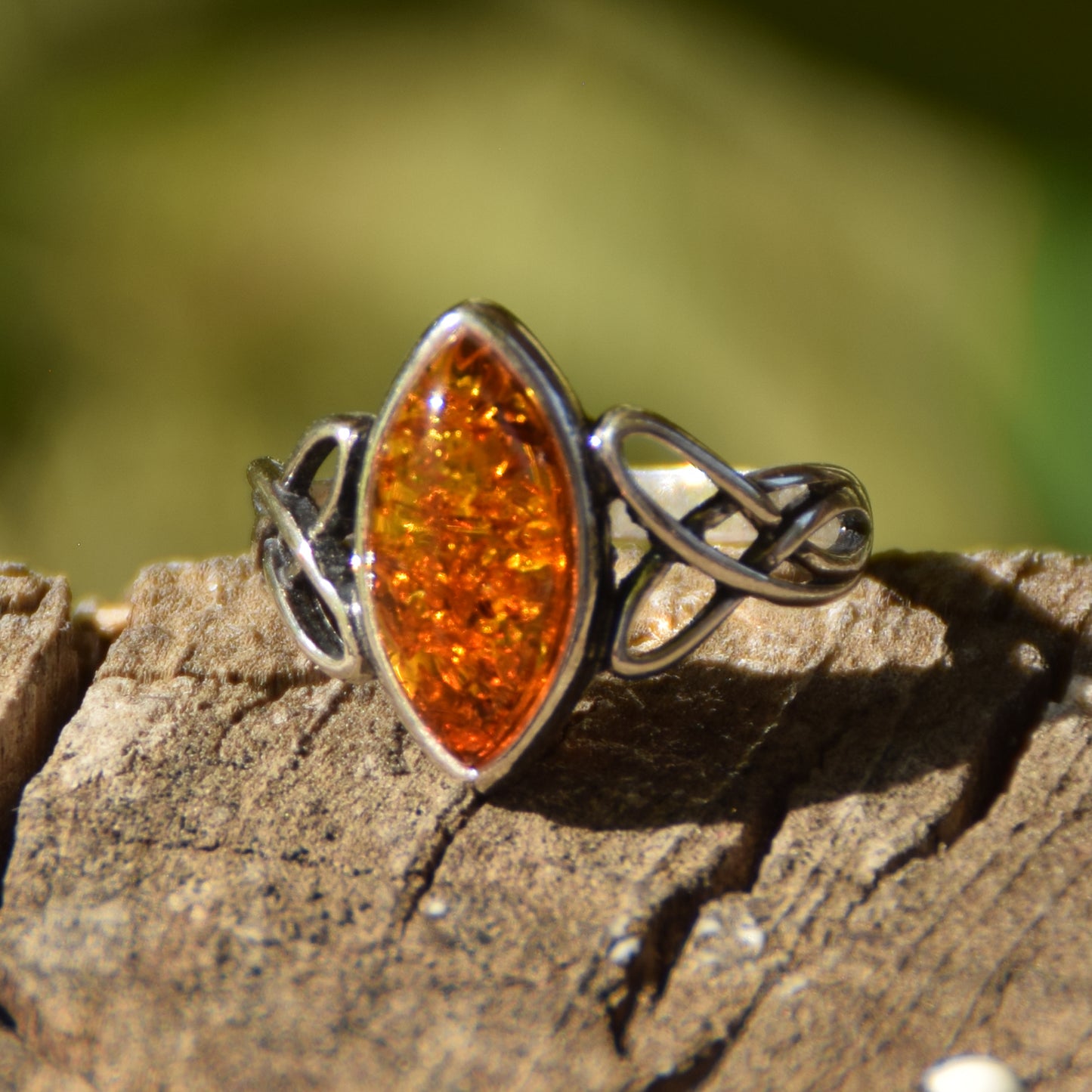 Ring with triskel created in natural cognac-colored Amber and 925 Sterling Silver, MJ Baltica, BP002