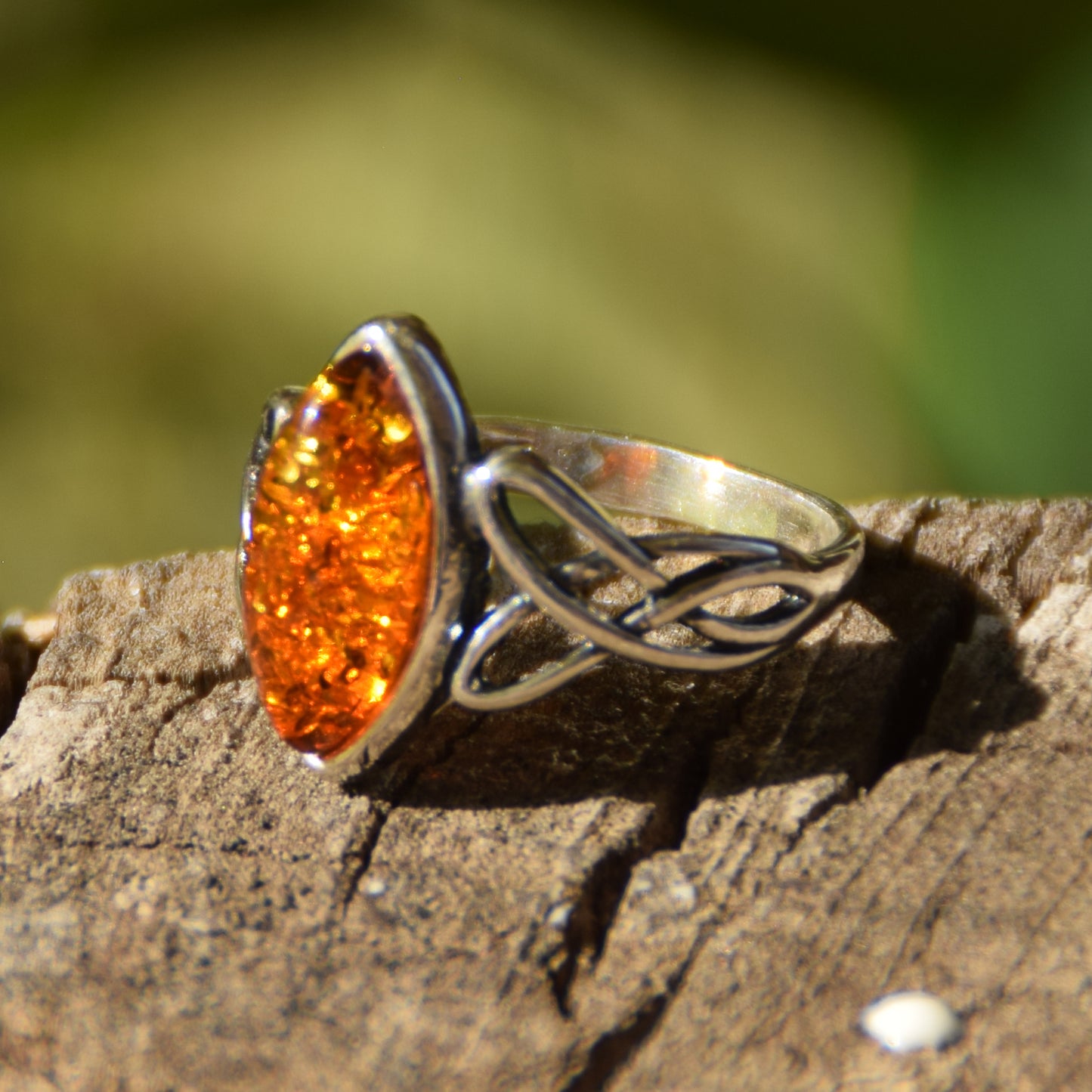 Ring with triskel created in natural cognac-colored Amber and 925 Sterling Silver, MJ Baltica, BP002
