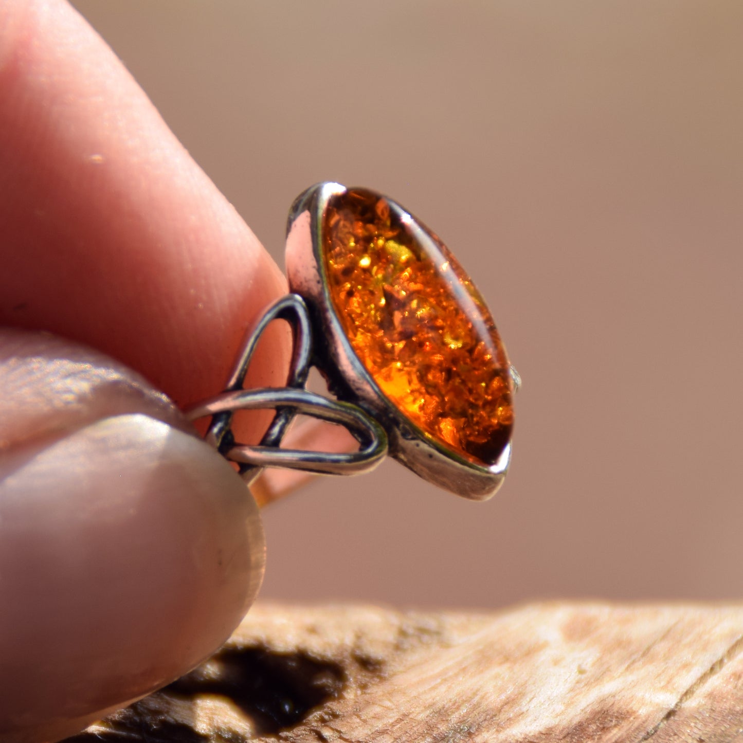 Ring with triskel created in natural cognac-colored Amber and 925 Sterling Silver, MJ Baltica, BP002
