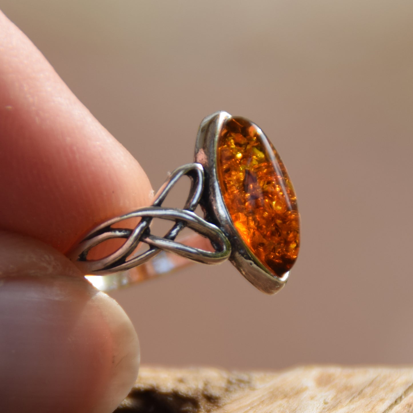 Ring with triskel created in natural cognac-colored Amber and 925 Sterling Silver, MJ Baltica, BP002