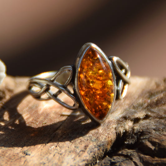 Ring with triskel created in natural cognac-colored Amber and 925 Sterling Silver, MJ Baltica, BP002
