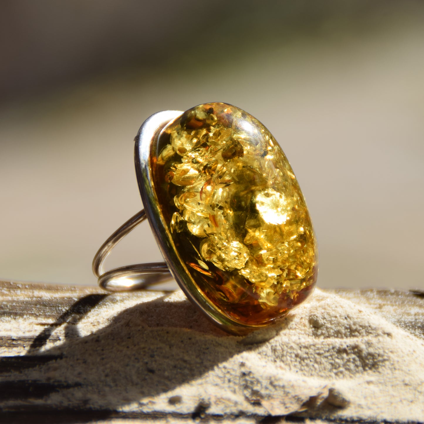 Luminous adjustable ring with large natural green Amber gemstone and 925 Silver, MJ Baltica, BP038
