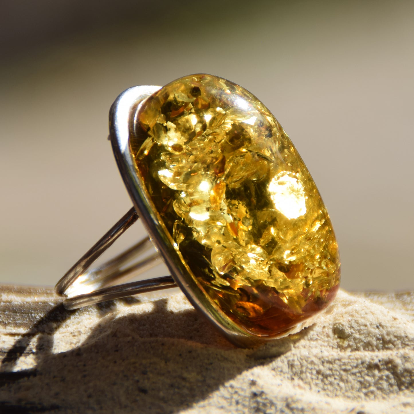 Luminous adjustable ring with large natural green Amber gemstone and 925 Silver, MJ Baltica, BP038