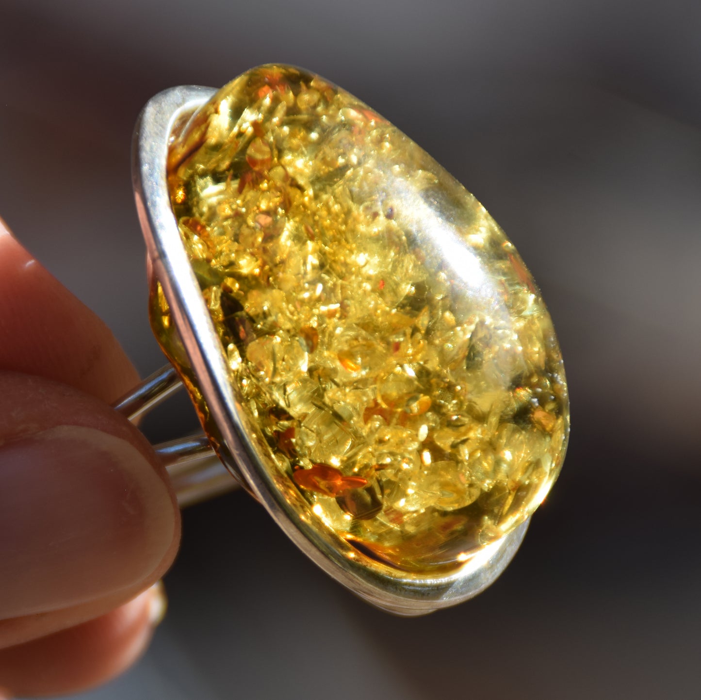 Luminous adjustable ring with large natural green Amber gemstone and 925 Silver, MJ Baltica, BP038