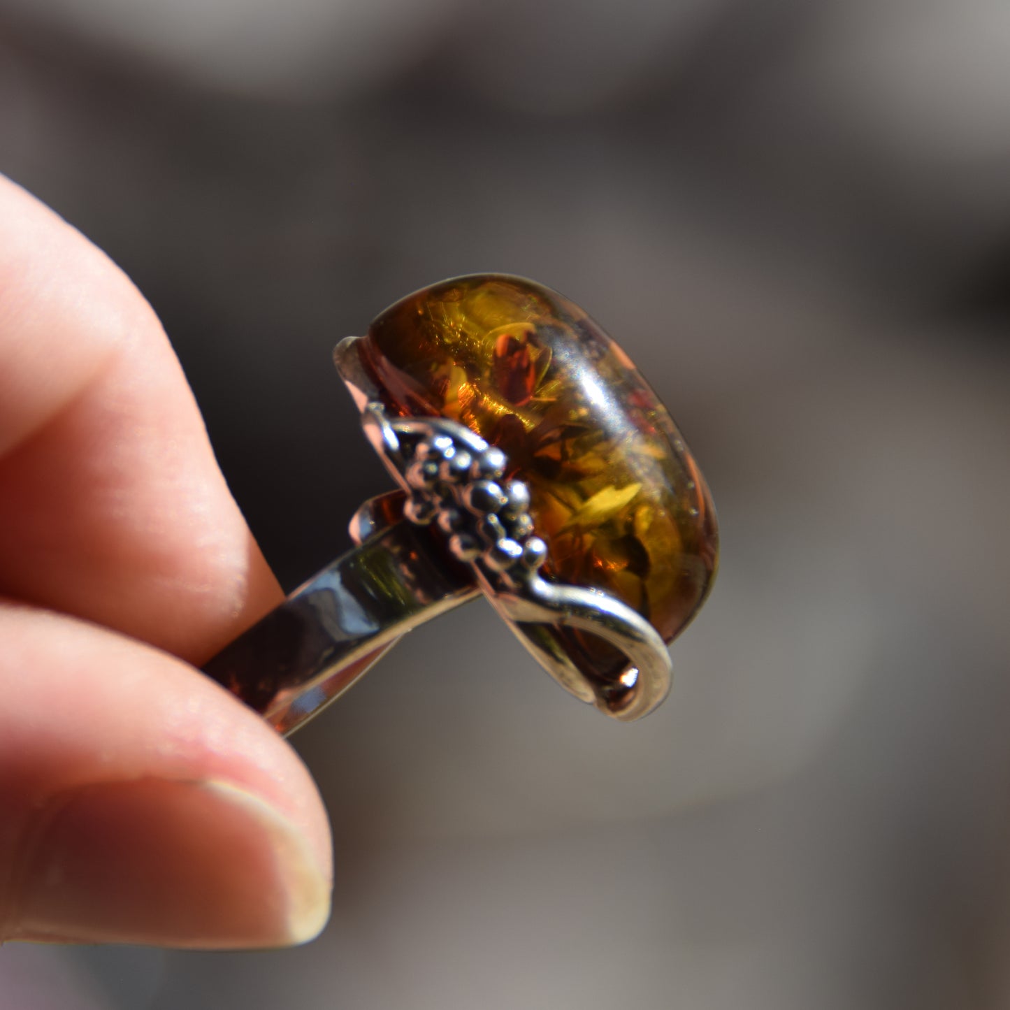 Adjustable ring with a unique natural Amber gemstone in green and brown hues and 925 Silver, MJ Baltica, BP043