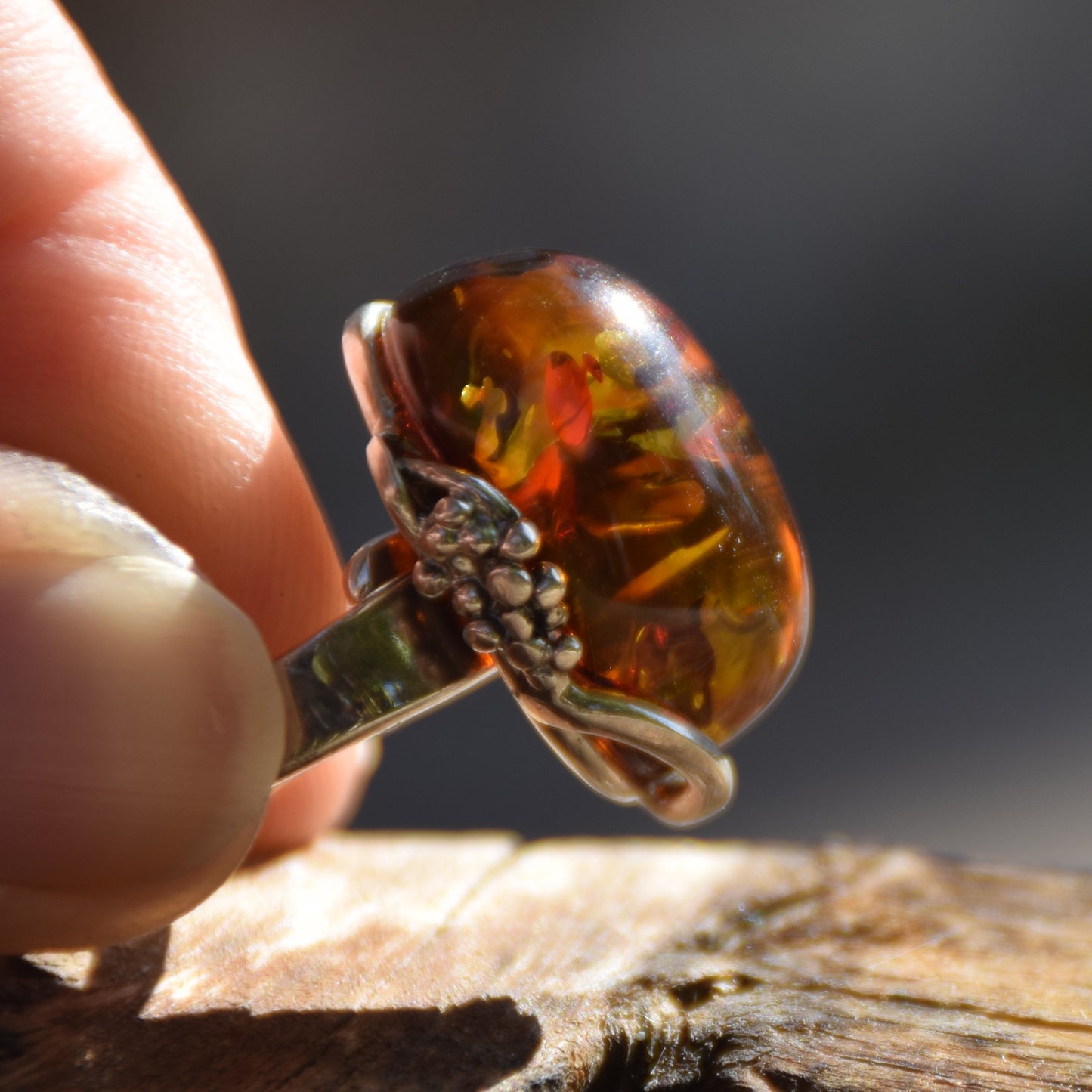 Adjustable ring with a unique natural Amber gemstone in green and brown hues and 925 Silver, MJ Baltica, BP043