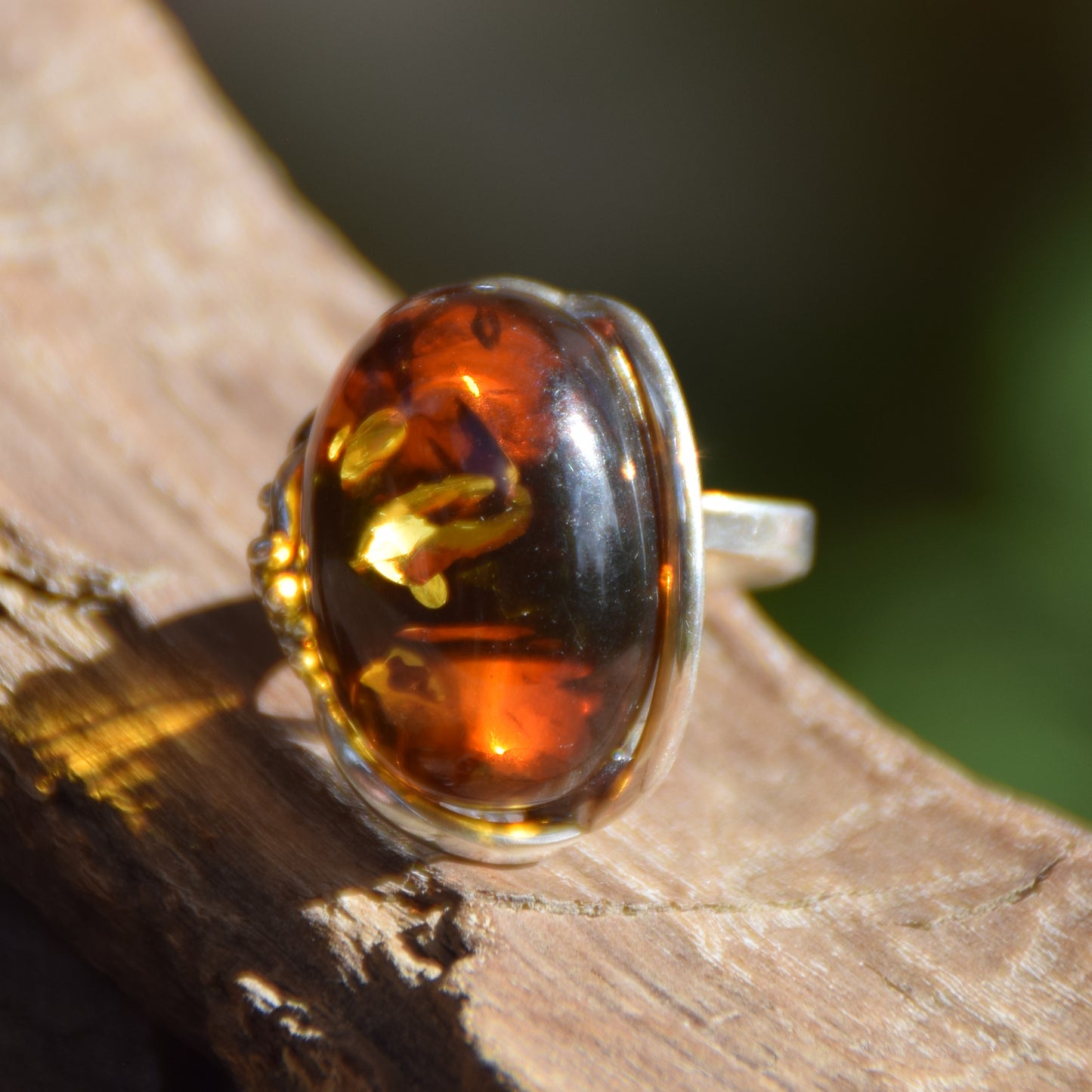Adjustable ring with a unique natural Amber gemstone in green and brown hues and 925 Silver, MJ Baltica, BP043