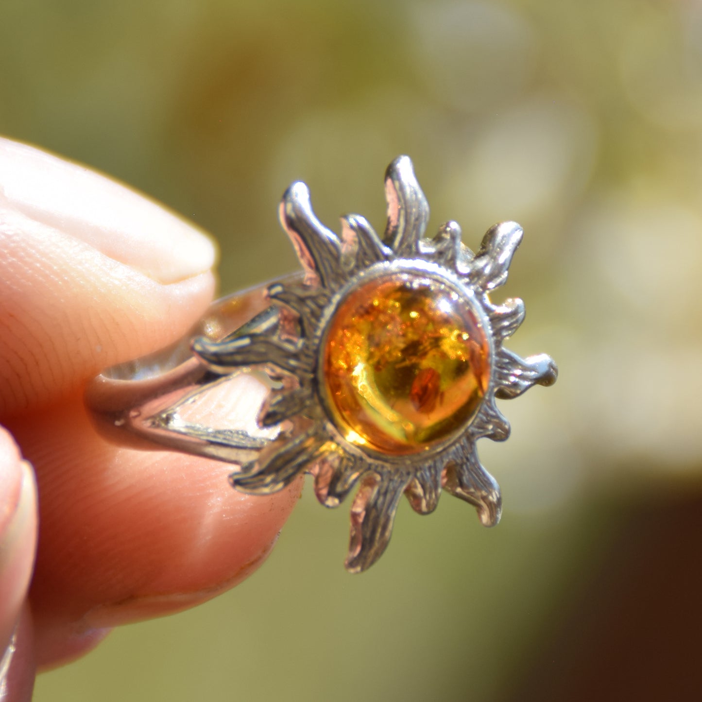 Bright ring with large sun in natural cognac Amber and 925 Silver, MJ Baltica, BP046