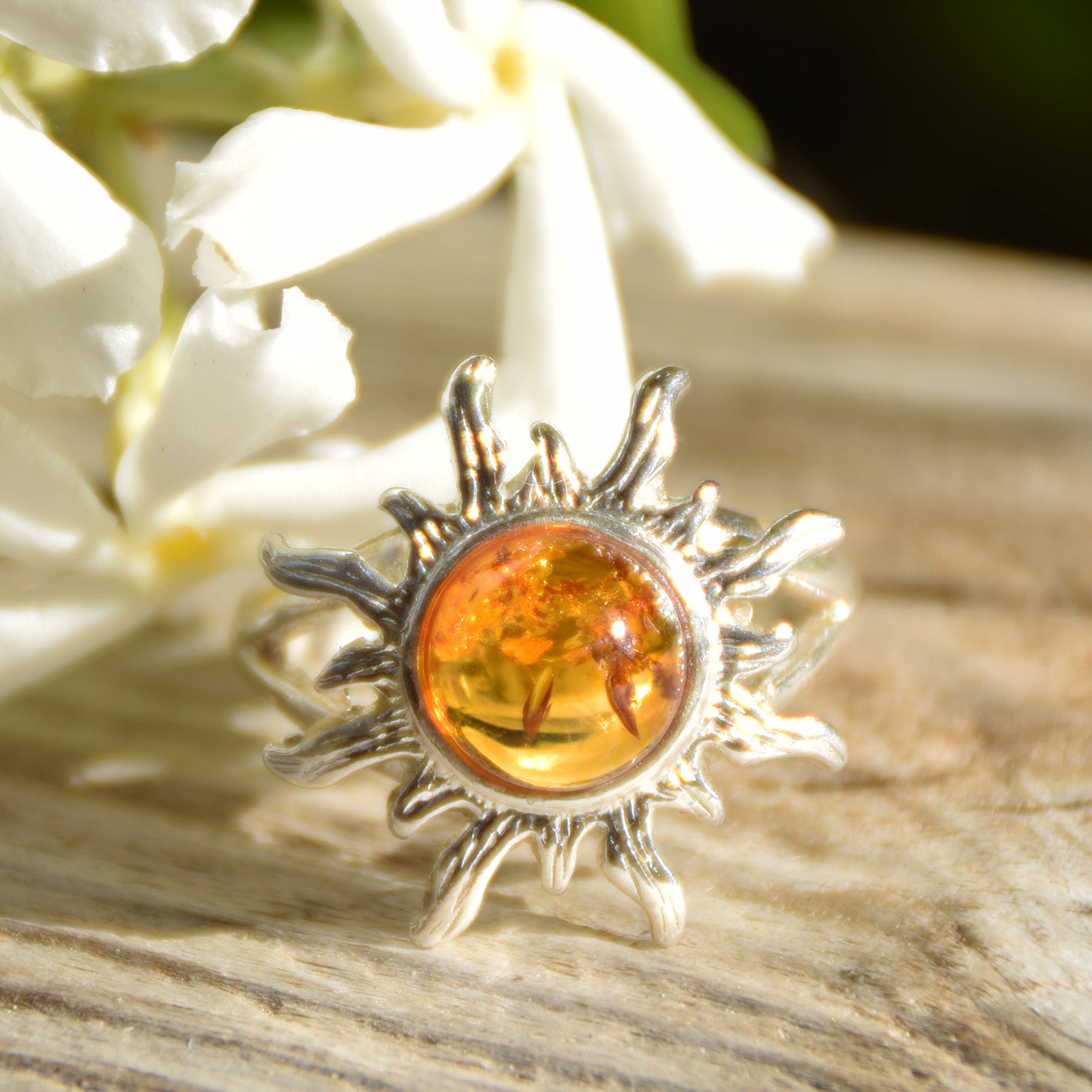Bright ring with large sun in natural cognac Amber and 925 Silver, MJ Baltica, BP046