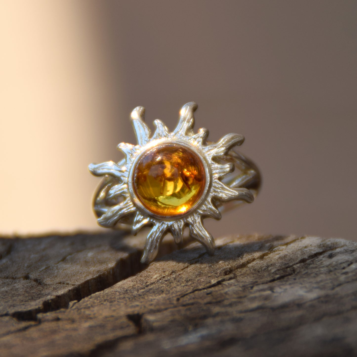 Bright ring with large sun in natural cognac Amber and 925 Silver, MJ Baltica, BP046