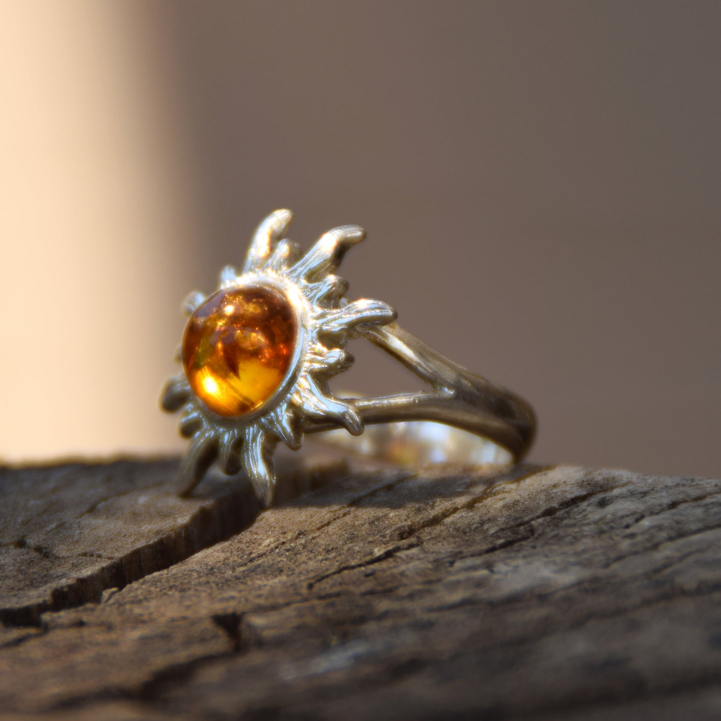 Bright ring with large sun in natural cognac Amber and 925 Silver, MJ Baltica, BP046