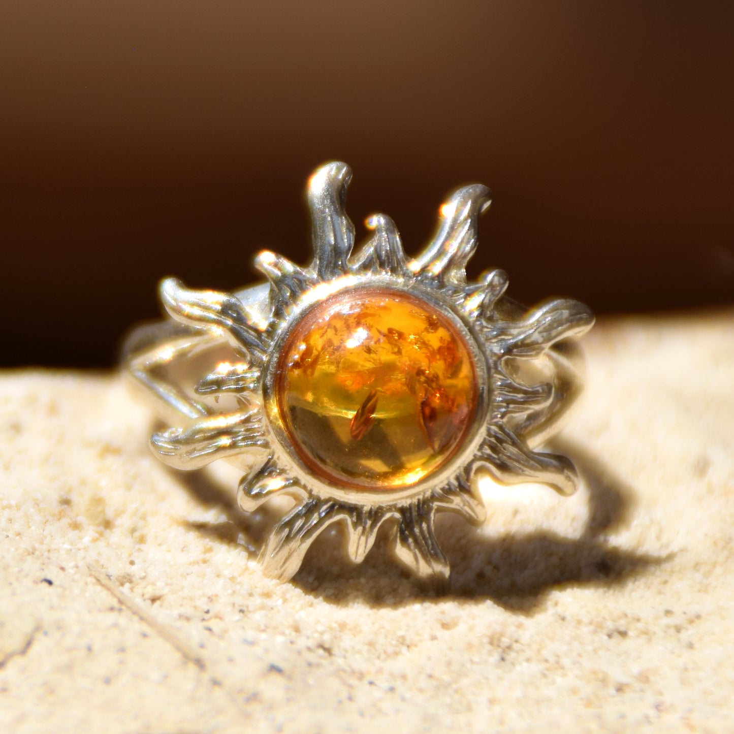 Bright ring with large sun in natural cognac Amber and 925 Silver, MJ Baltica, BP046