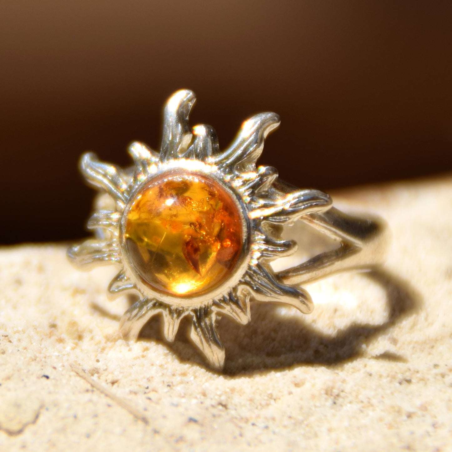 Bright ring with large sun in natural cognac Amber and 925 Silver, MJ Baltica, BP046