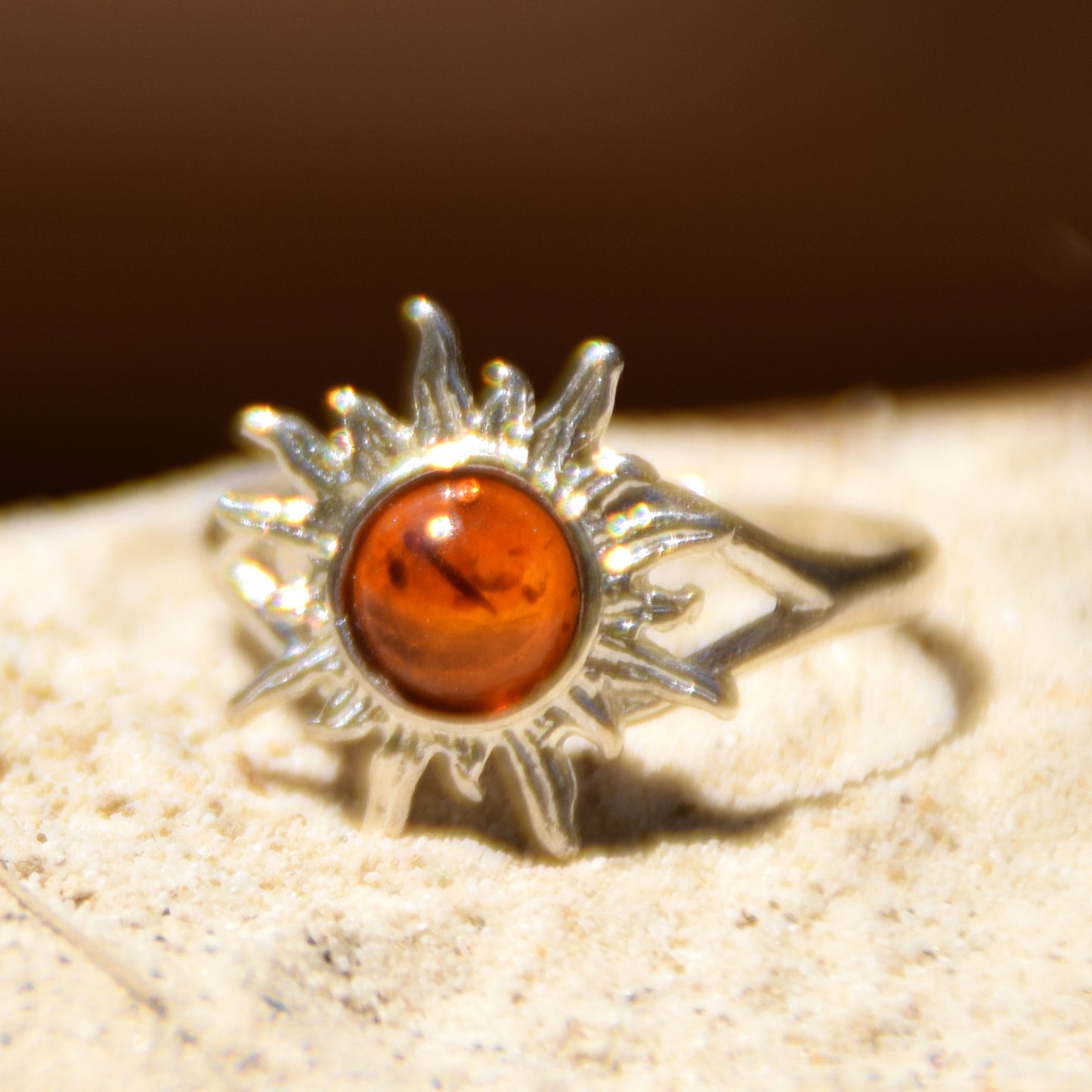 Bright ring with a delicate sun created with cognac-colored natural Amber and 925 Silver, MJ Baltica, BP050