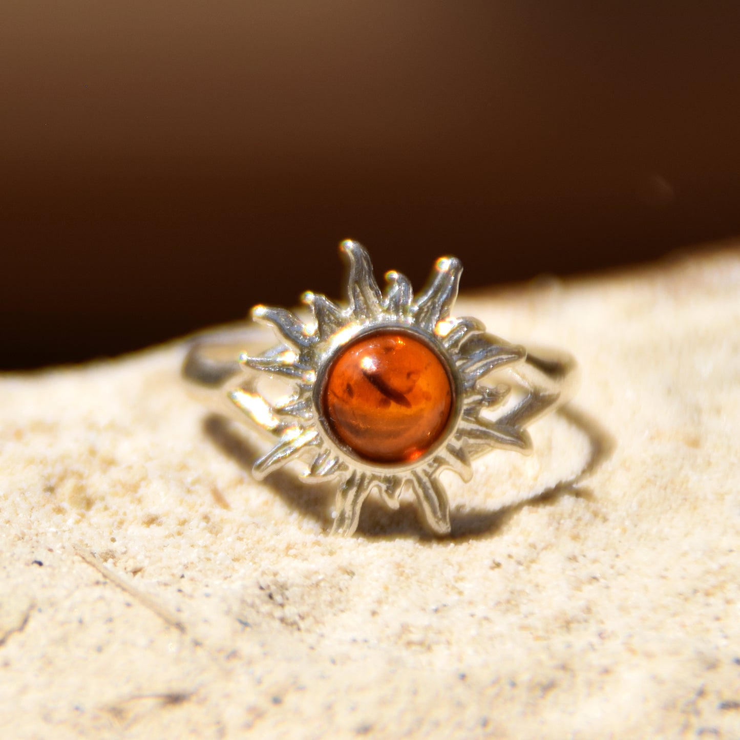 Bright ring with a delicate sun created with cognac-colored natural Amber and 925 Silver, MJ Baltica, BP050
