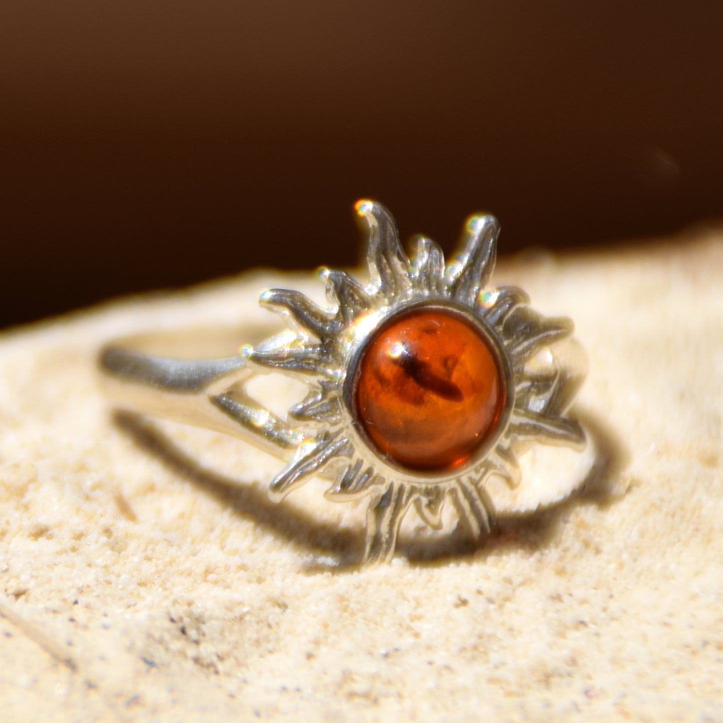 Bright ring with a delicate sun created with cognac-colored natural Amber and 925 Silver, MJ Baltica, BP050