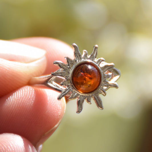 Bright ring with a delicate sun created with cognac-colored natural Amber and 925 Silver, MJ Baltica, BP050