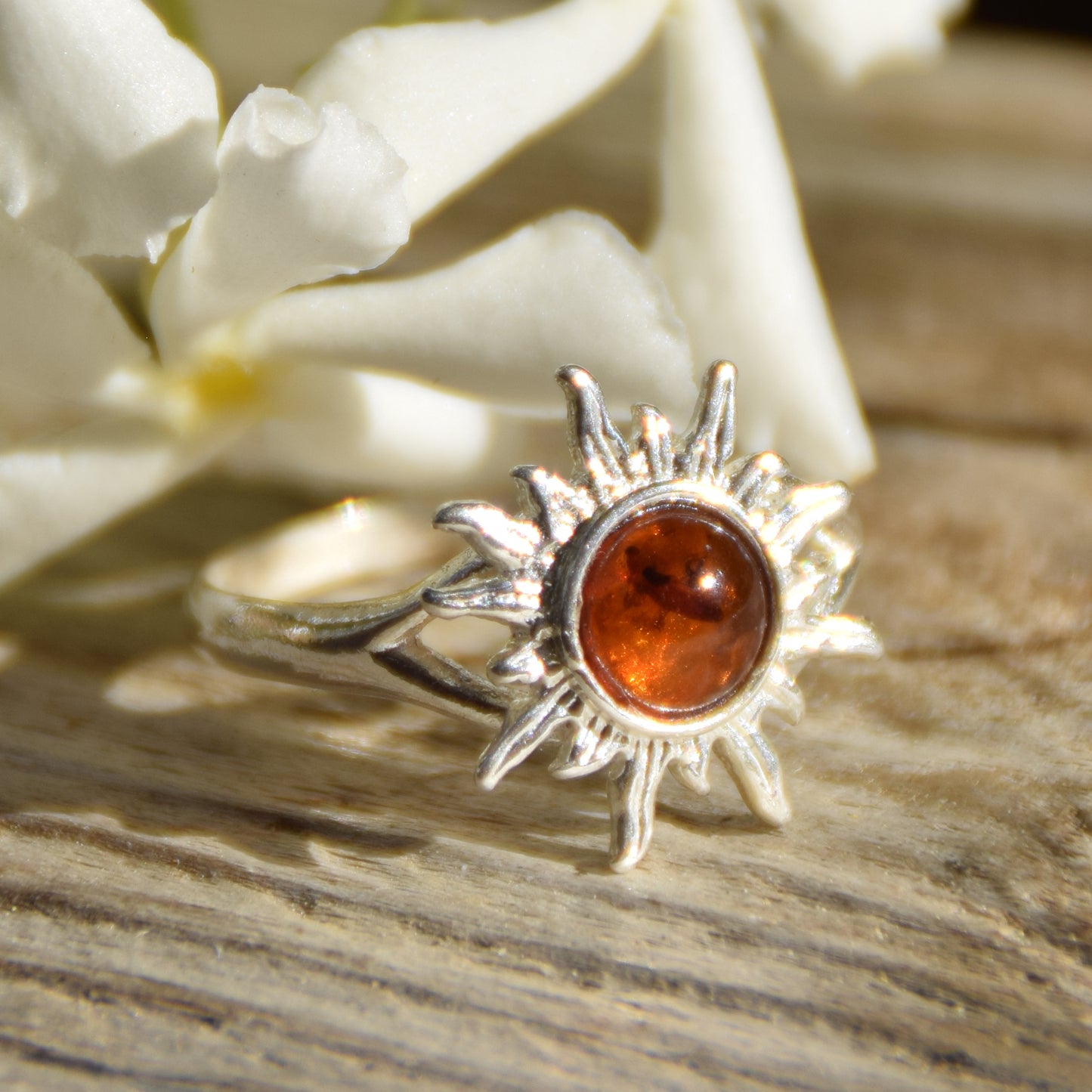 Bright ring with a delicate sun created with cognac-colored natural Amber and 925 Silver, MJ Baltica, BP050