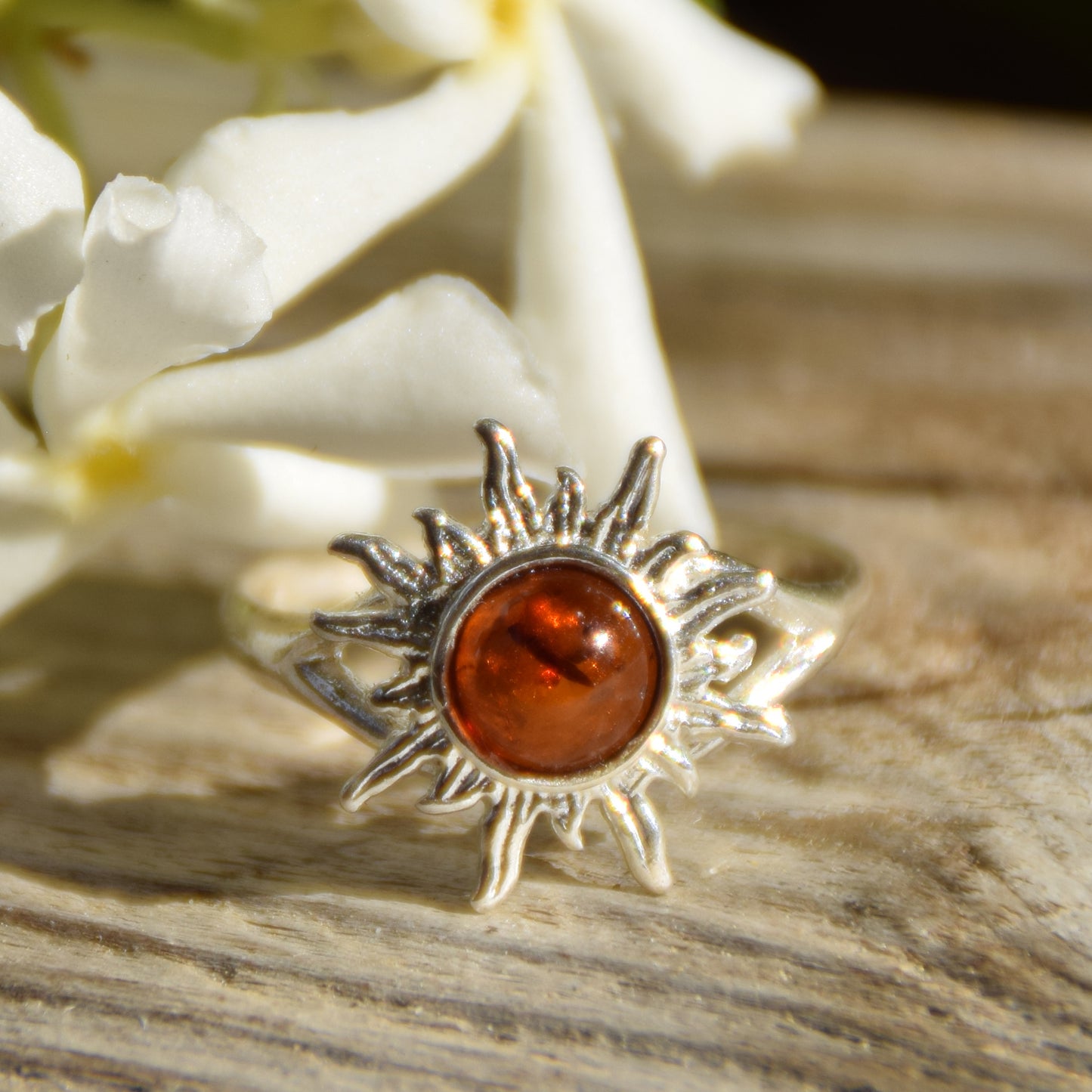 Bright ring with a delicate sun created with cognac-colored natural Amber and 925 Silver, MJ Baltica, BP050
