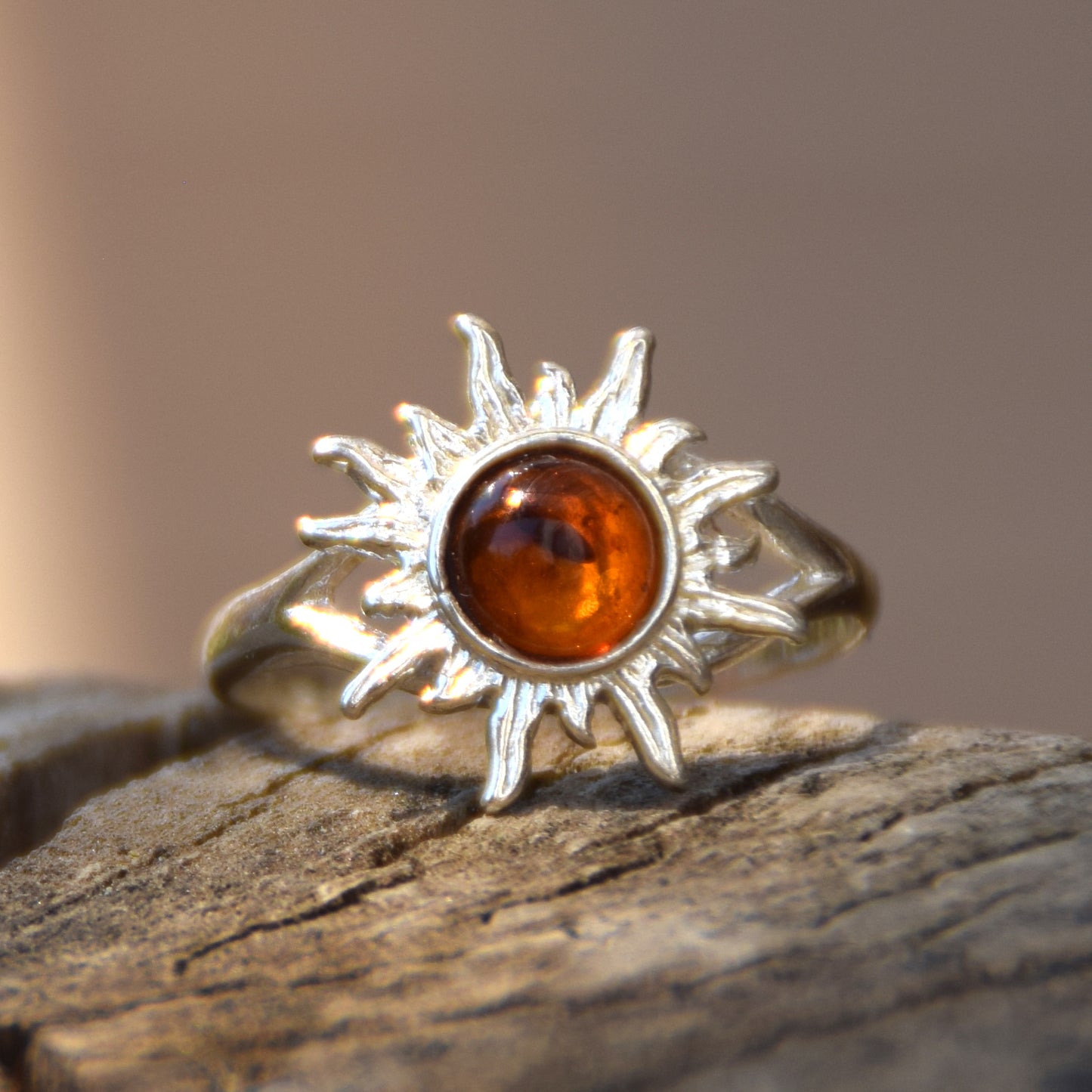 Bright ring with a delicate sun created with cognac-colored natural Amber and 925 Silver, MJ Baltica, BP050