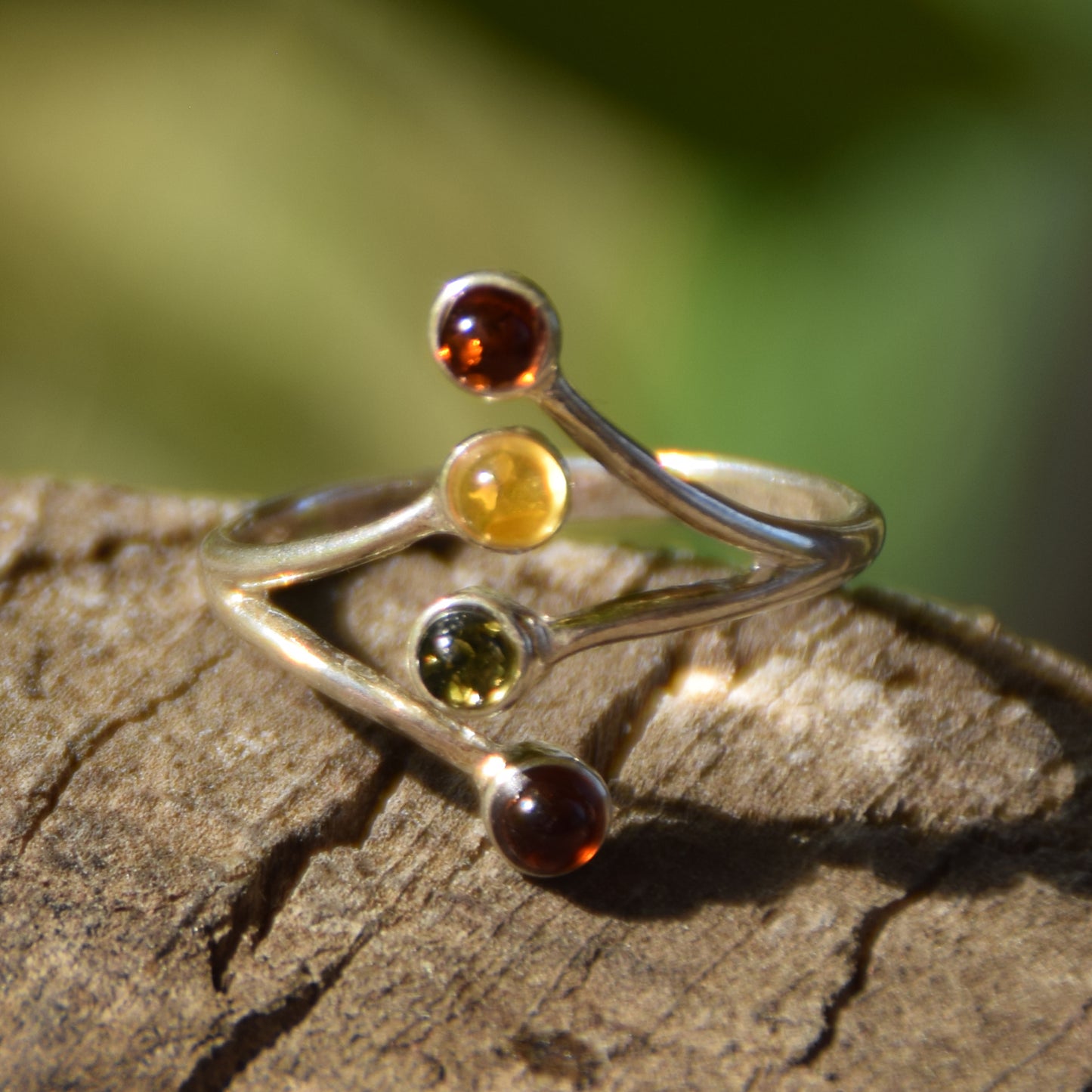 Bright adjustable ring made with natural Amber of various shades and 925 Silver, MJ Baltica, BP056