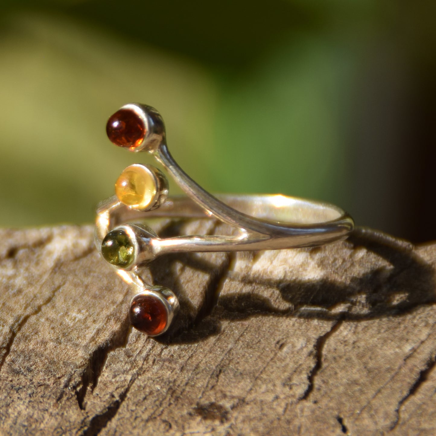 Bright adjustable ring made with natural Amber of various shades and 925 Silver, MJ Baltica, BP056