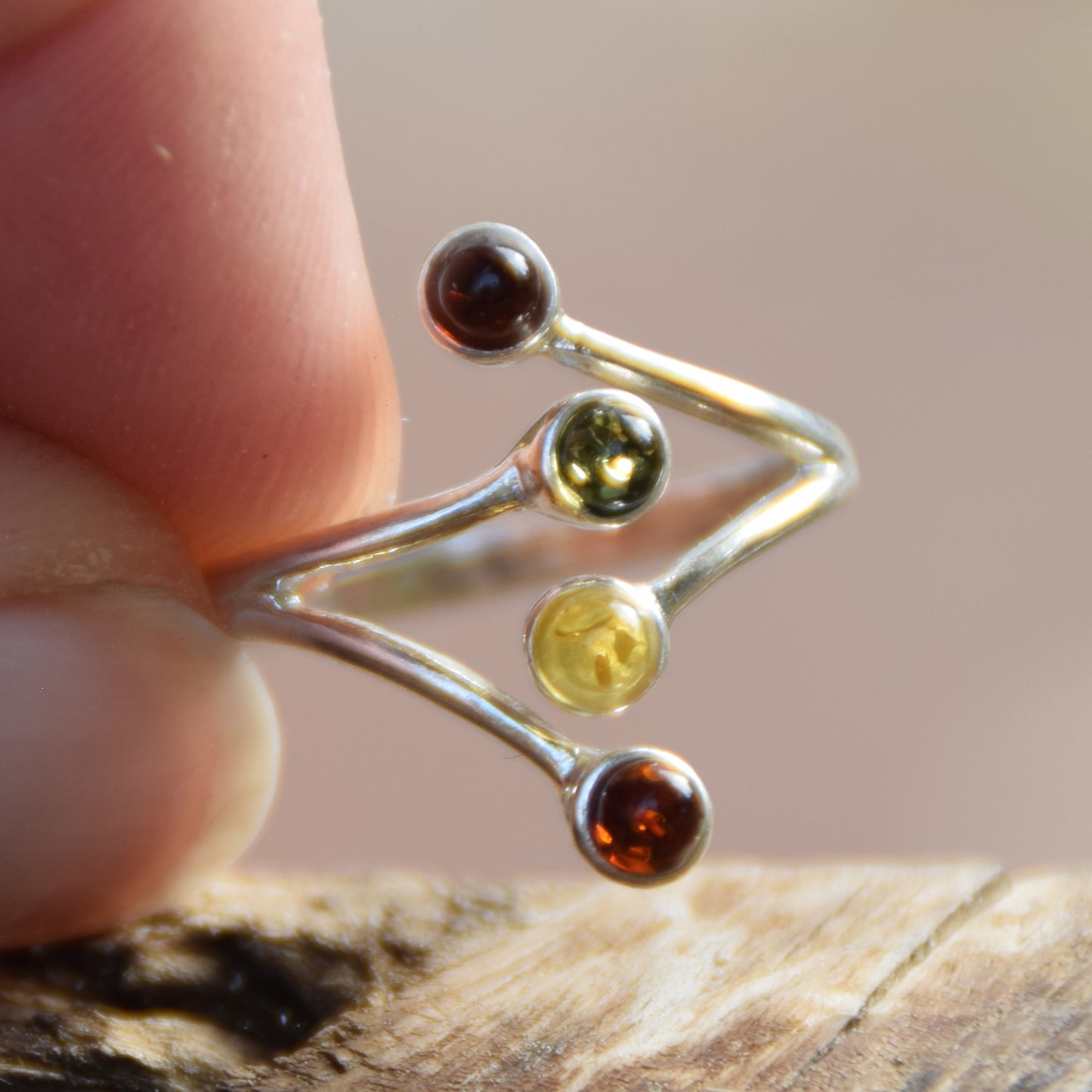 Bright adjustable ring made with natural Amber of various shades and 925 Silver, MJ Baltica, BP056