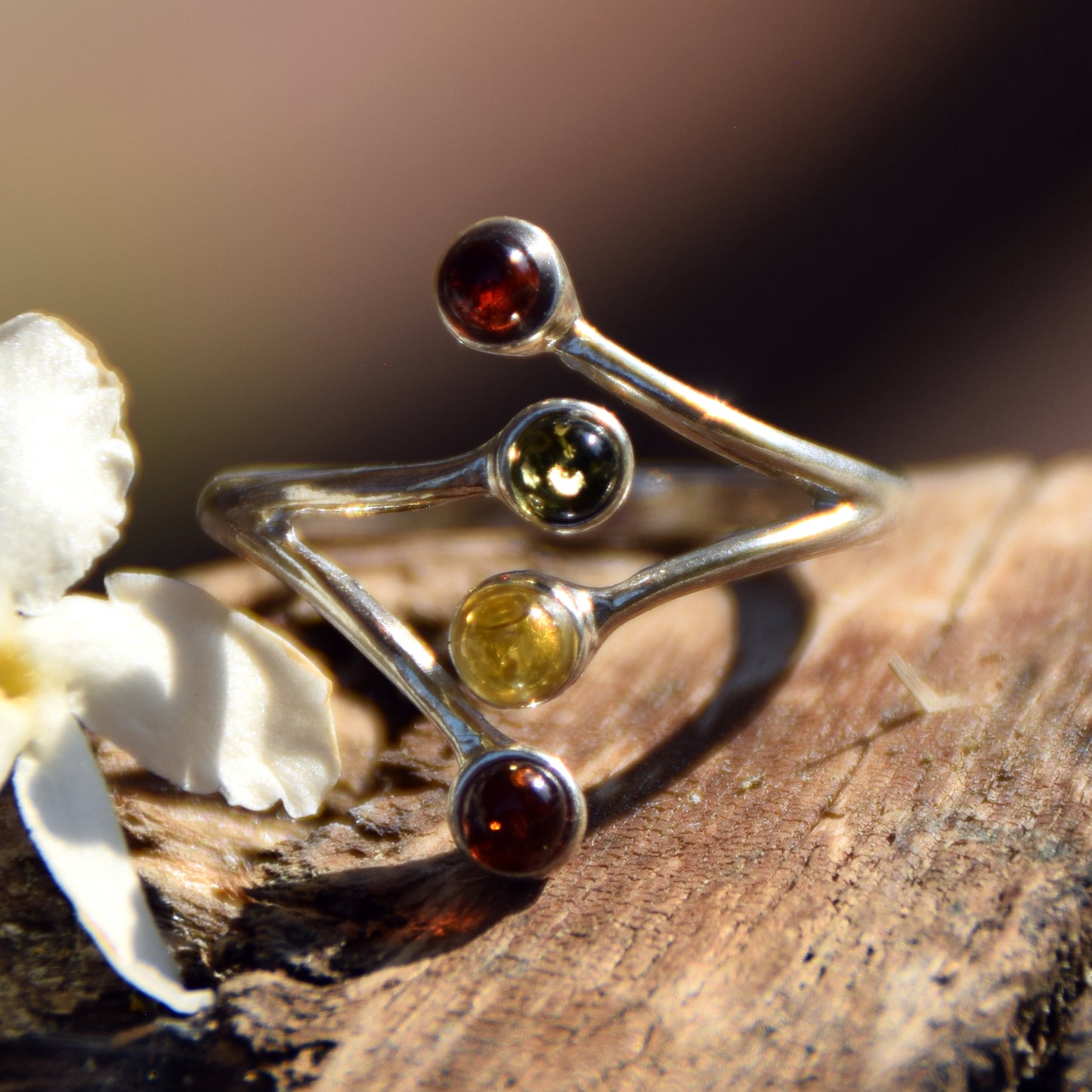 Bright adjustable ring made with natural Amber of various shades and 925 Silver, MJ Baltica, BP056