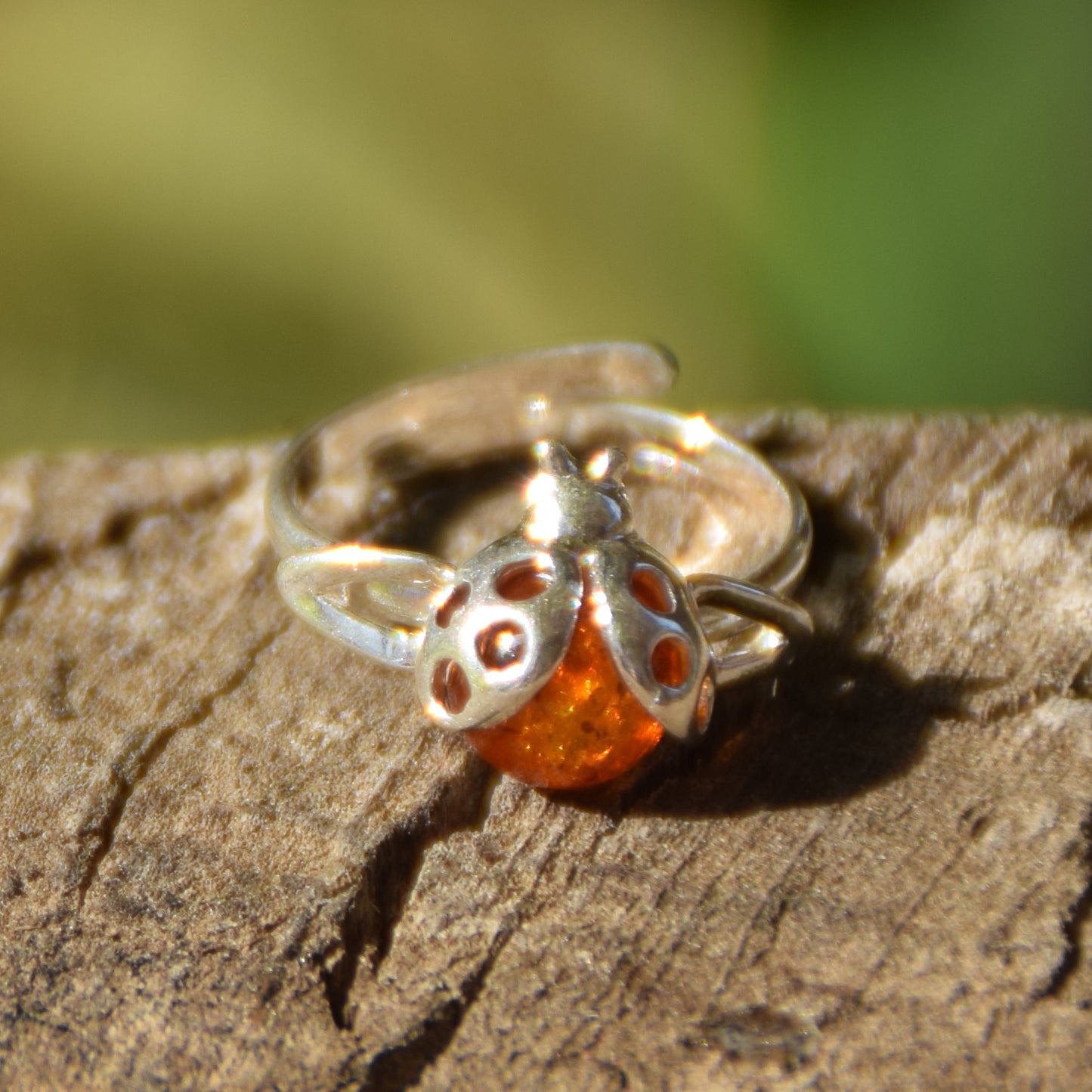 Delicate adjustable ring with a cognac natural amber ladybug and 925 Sterling Silver, MJ Baltica, BP058