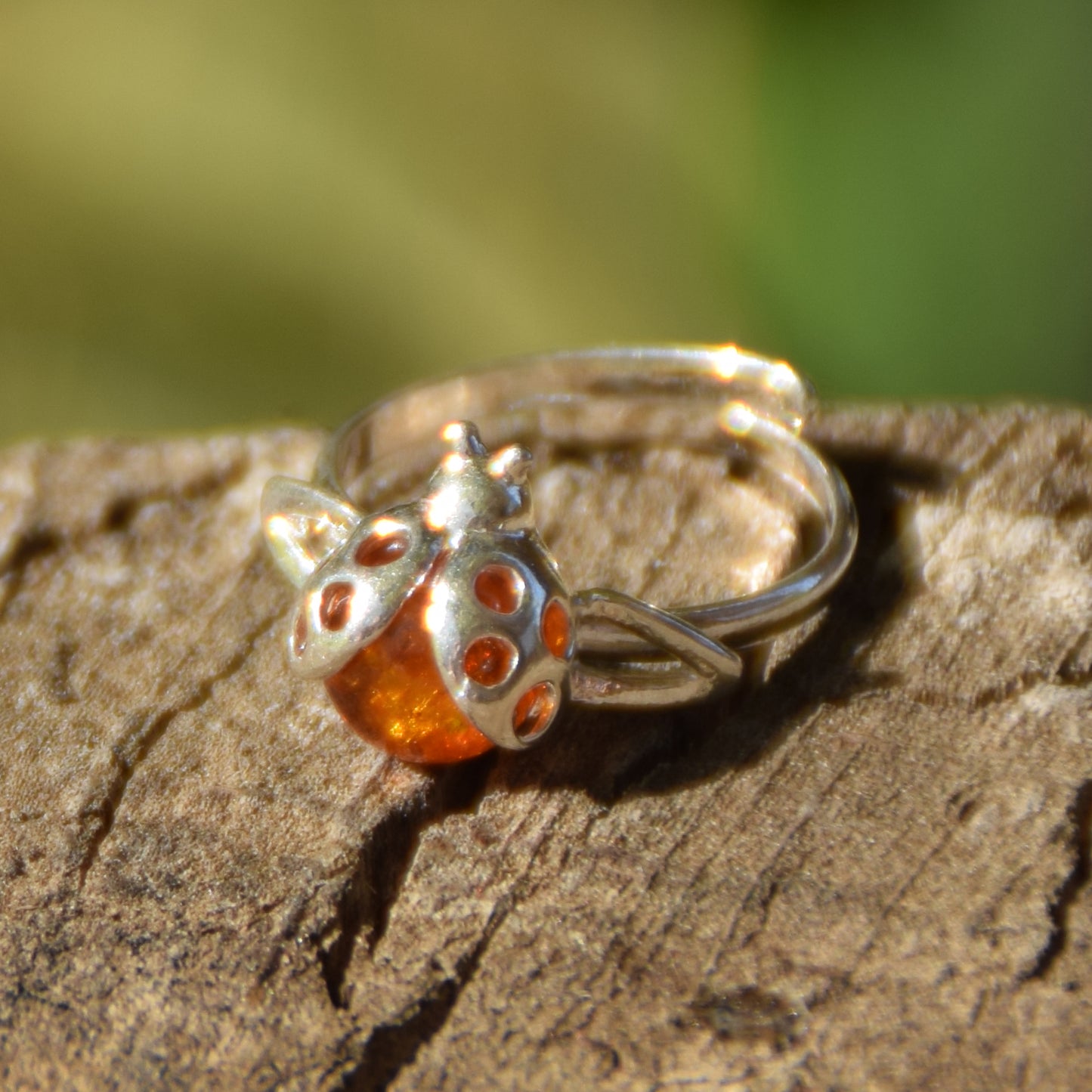 Delicate adjustable ring with a cognac natural amber ladybug and 925 Sterling Silver, MJ Baltica, BP058