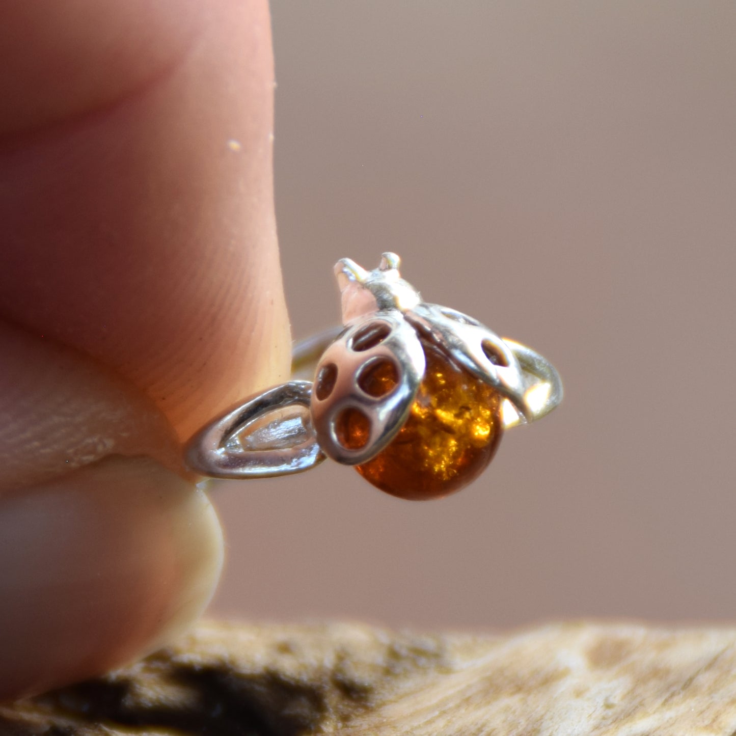 Delicate adjustable ring with a cognac natural amber ladybug and 925 Sterling Silver, MJ Baltica, BP058