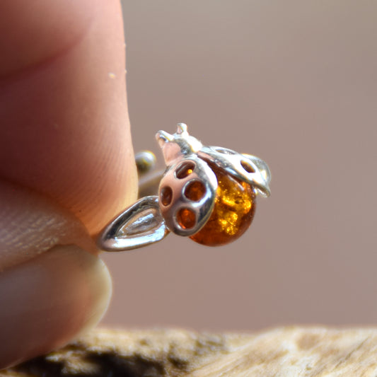 Delicate adjustable ring with a cognac natural amber ladybug and 925 Sterling Silver, MJ Baltica, BP058