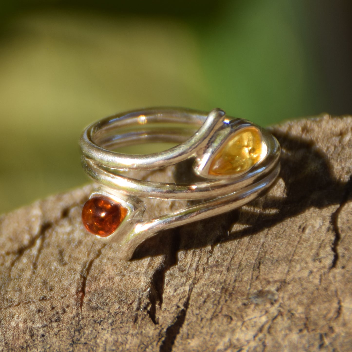 Luminous adjustable spiral ring in natural Amber of various shades and 925 Silver, MJ Baltica, BP070