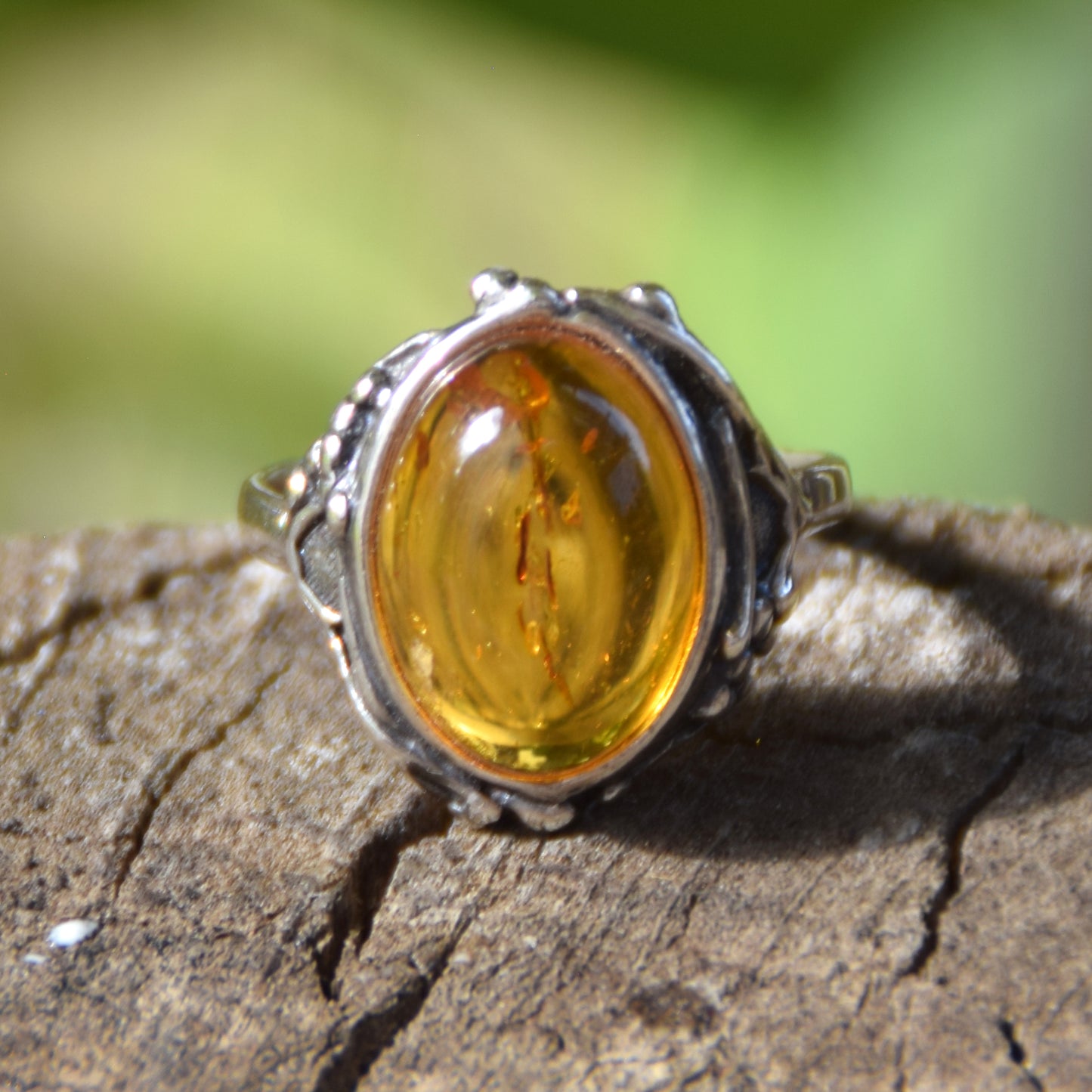 Classic floral design ring crafted with oval cognac natural Amber and 925 Sterling Silver, MJ Baltica, BP084