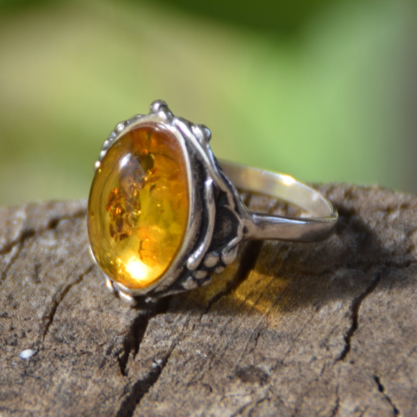 Classic floral design ring crafted with oval cognac natural Amber and 925 Sterling Silver, MJ Baltica, BP084