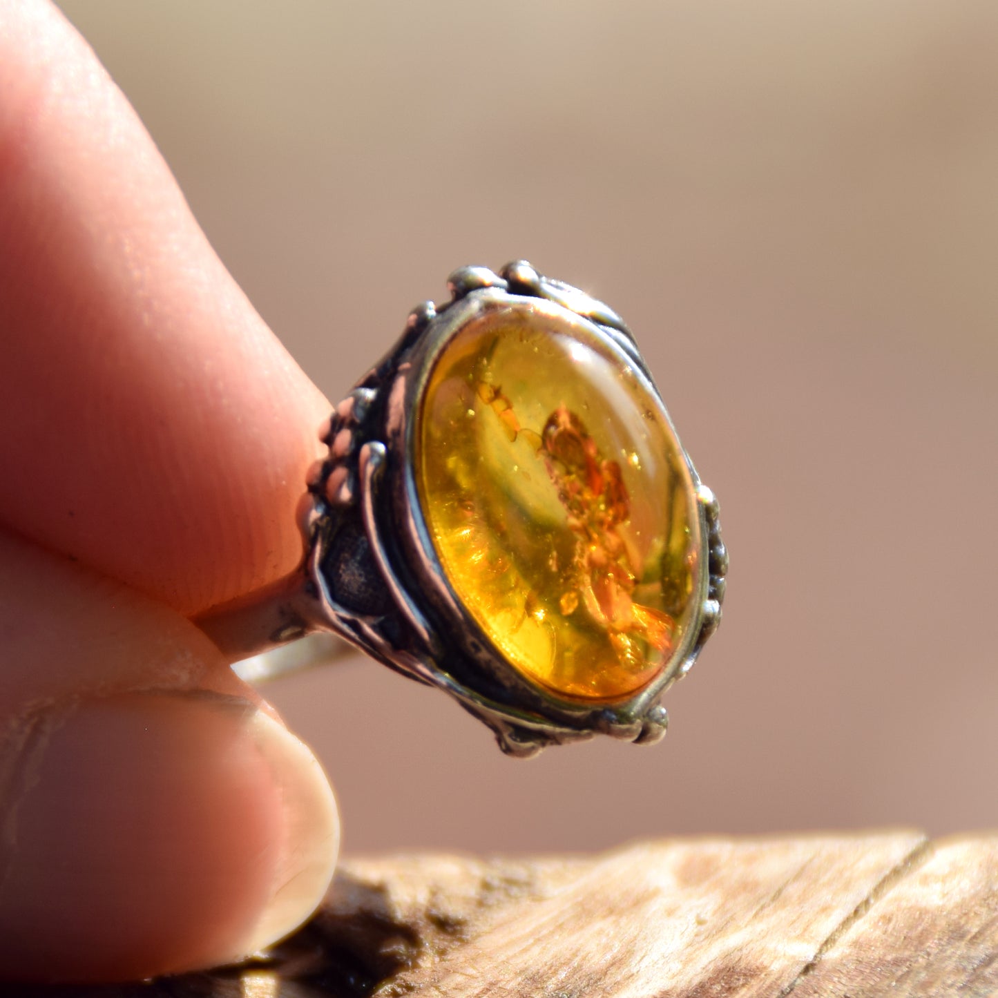 Classic floral design ring crafted with oval cognac natural Amber and 925 Sterling Silver, MJ Baltica, BP084