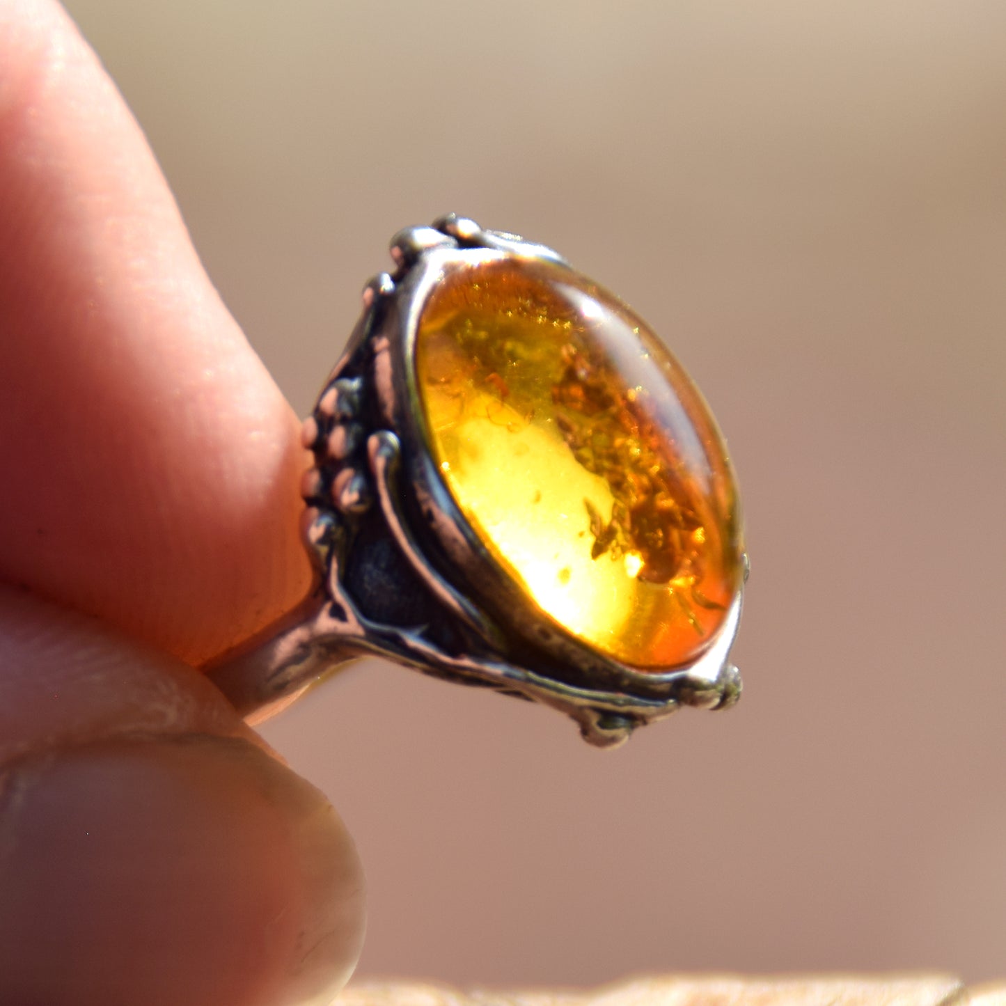 Classic floral design ring crafted with oval cognac natural Amber and 925 Sterling Silver, MJ Baltica, BP084