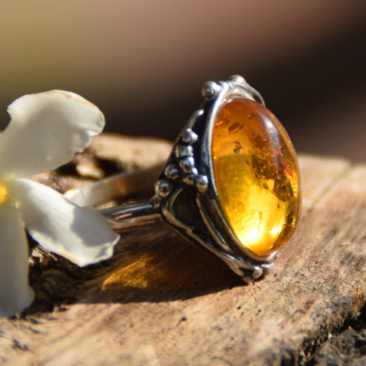 Classic floral design ring crafted with oval cognac natural Amber and 925 Sterling Silver, MJ Baltica, BP084
