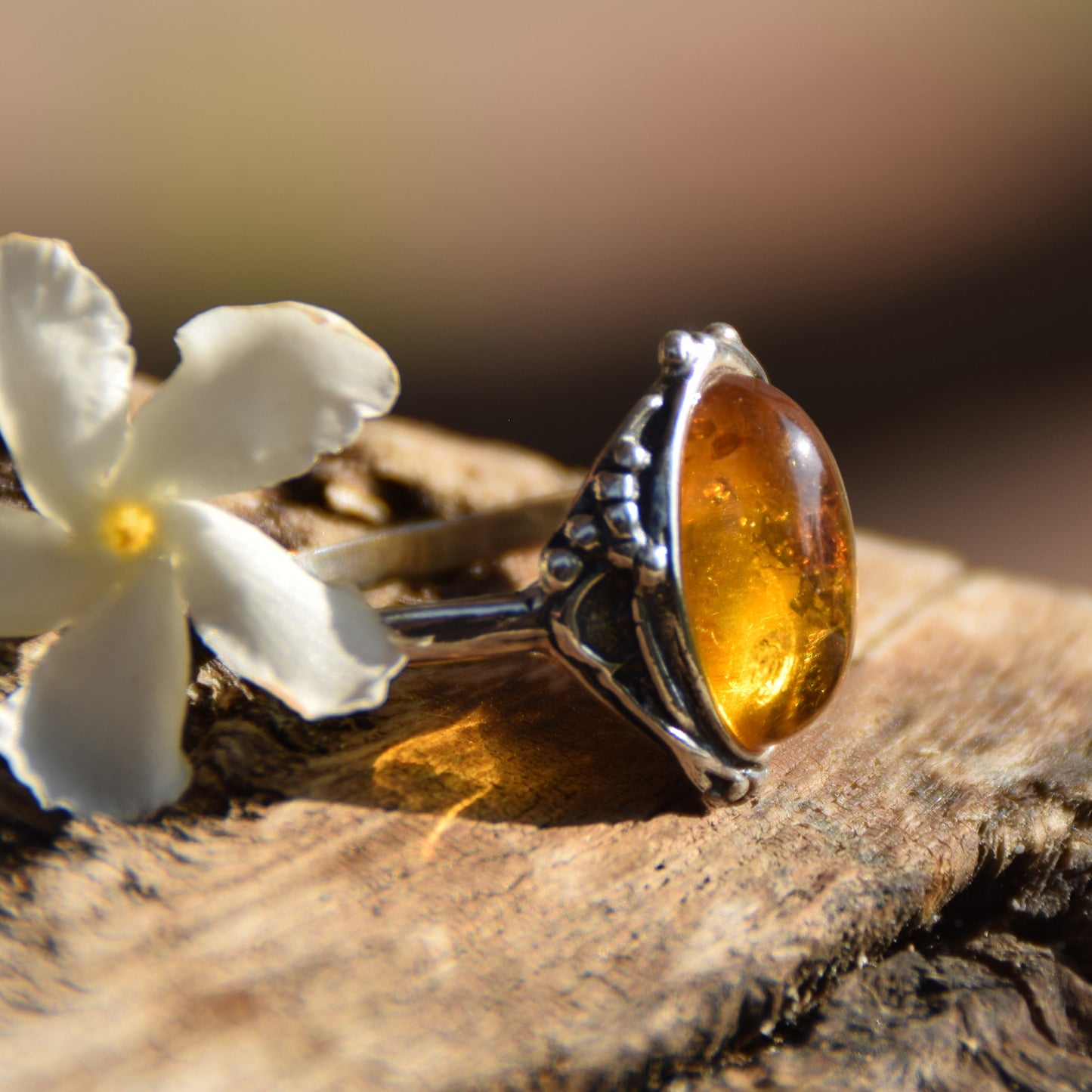 Classic floral design ring crafted with oval cognac natural Amber and 925 Sterling Silver, MJ Baltica, BP084