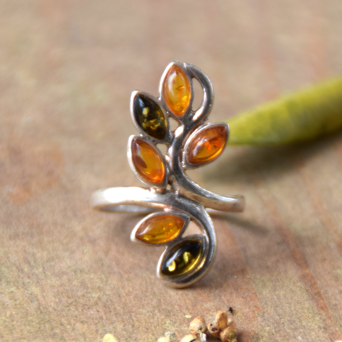 Tall band ring in a floral style created with natural Amber of various shades and 925 Silver, MJ Baltica, BP091
