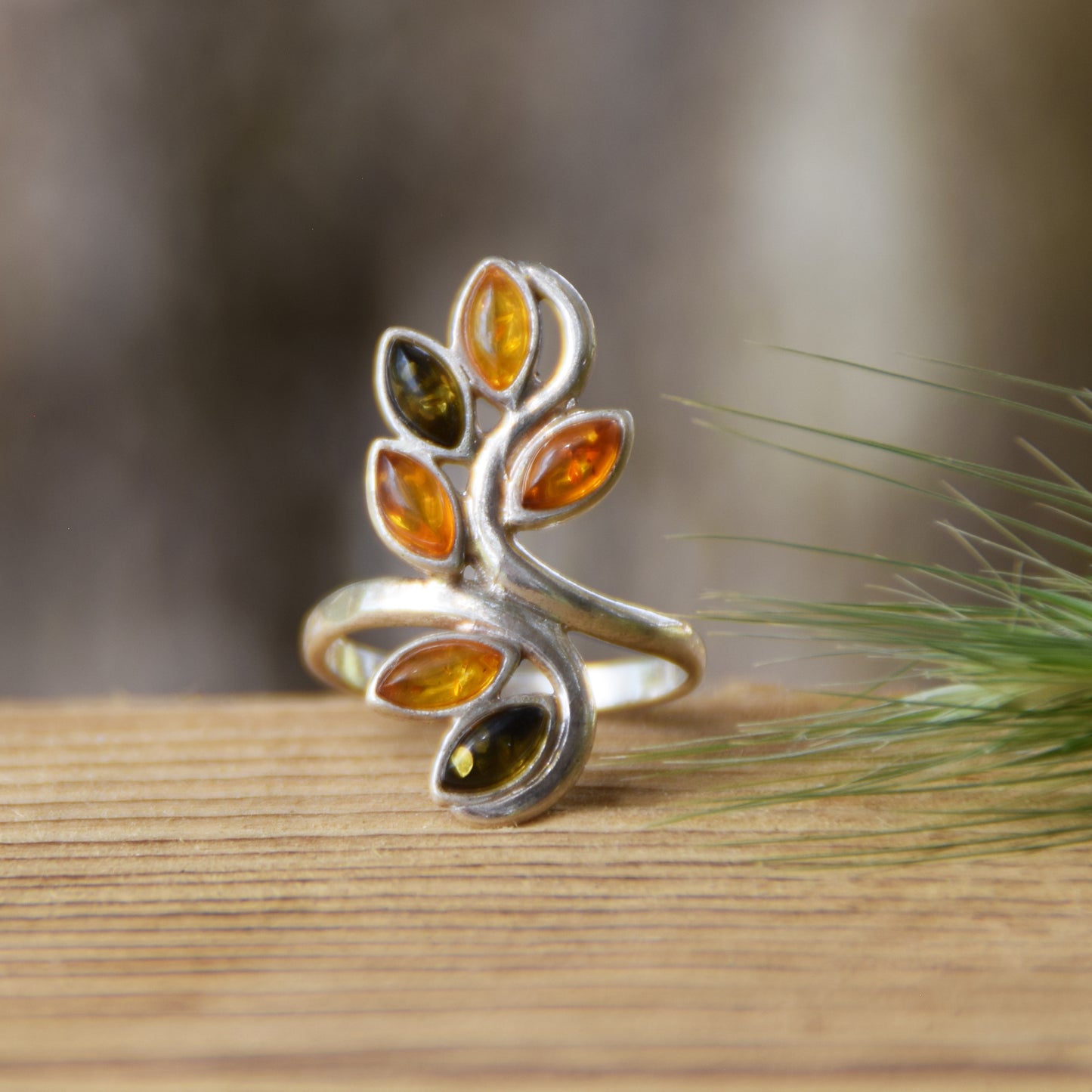 Tall band ring in a floral style created with natural Amber of various shades and 925 Silver, MJ Baltica, BP091