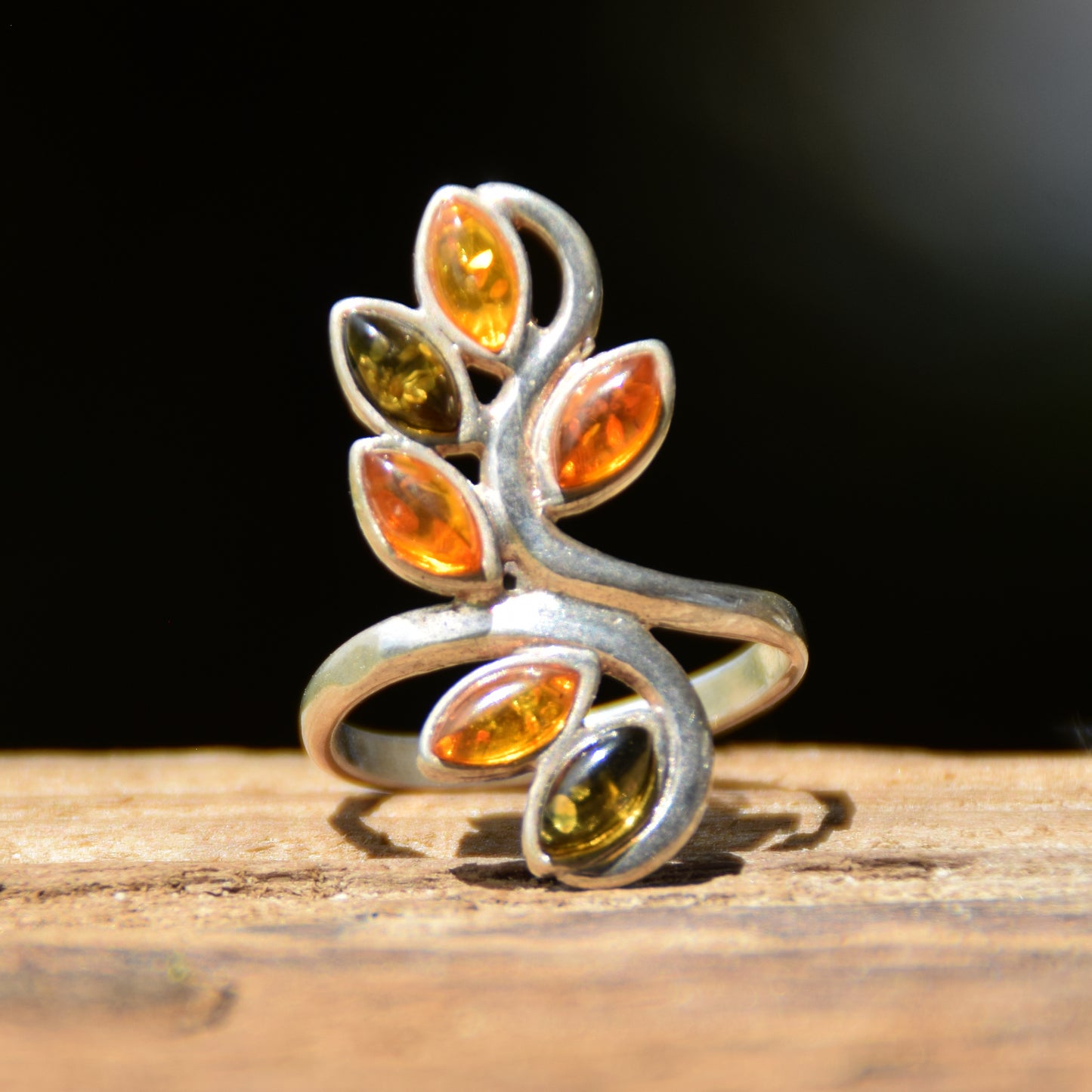 Tall band ring in a floral style created with natural Amber of various shades and 925 Silver, MJ Baltica, BP091