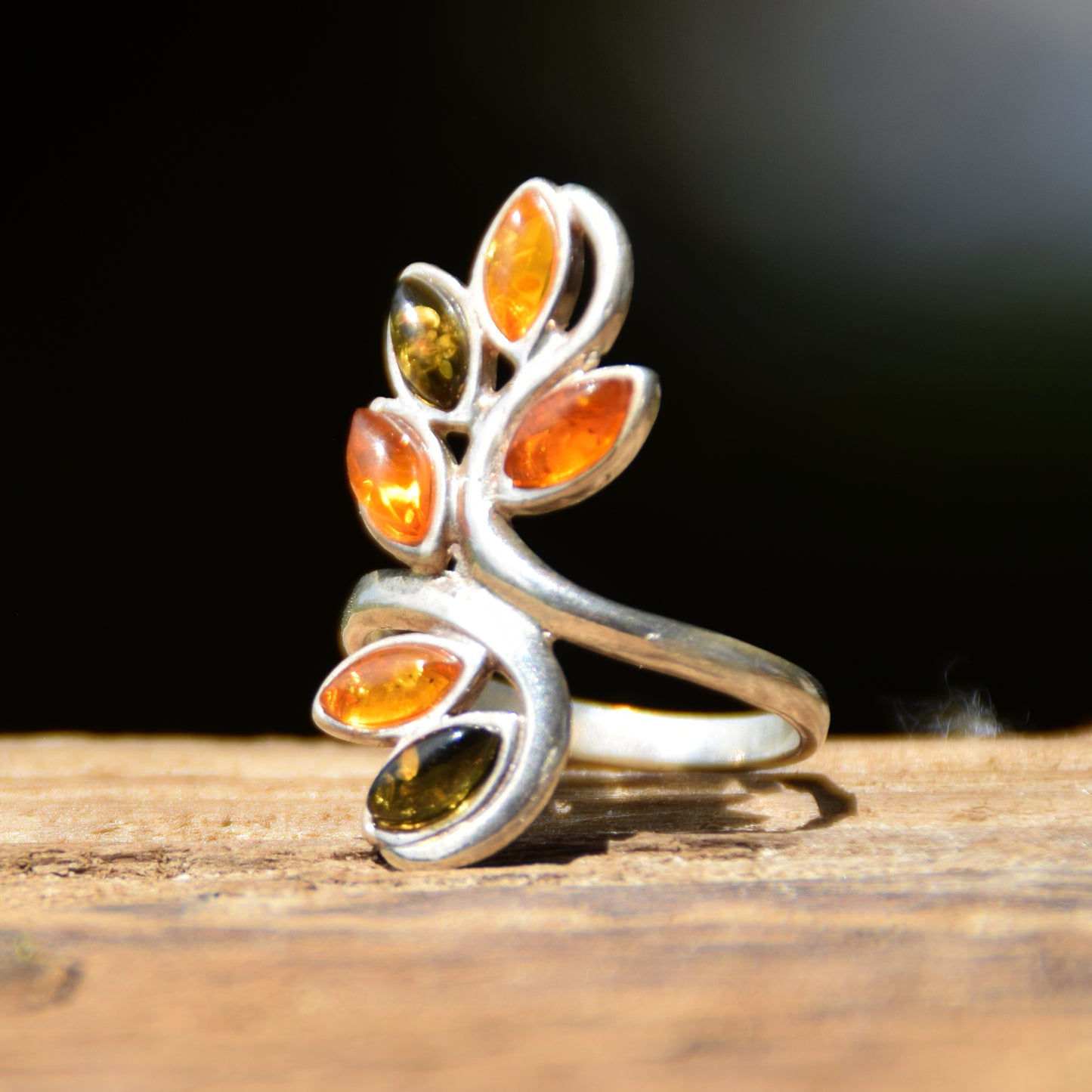 Tall band ring in a floral style created with natural Amber of various shades and 925 Silver, MJ Baltica, BP091