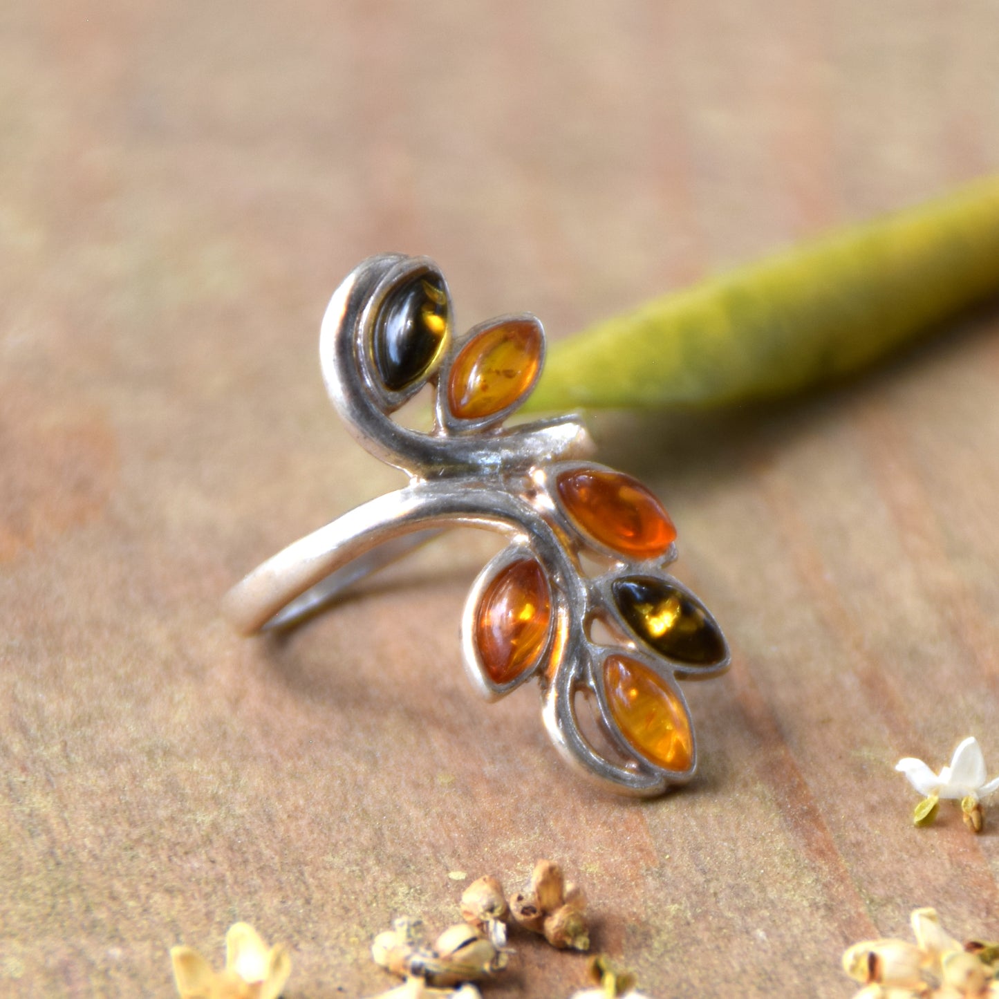 Tall band ring in a floral style created with natural Amber of various shades and 925 Silver, MJ Baltica, BP091