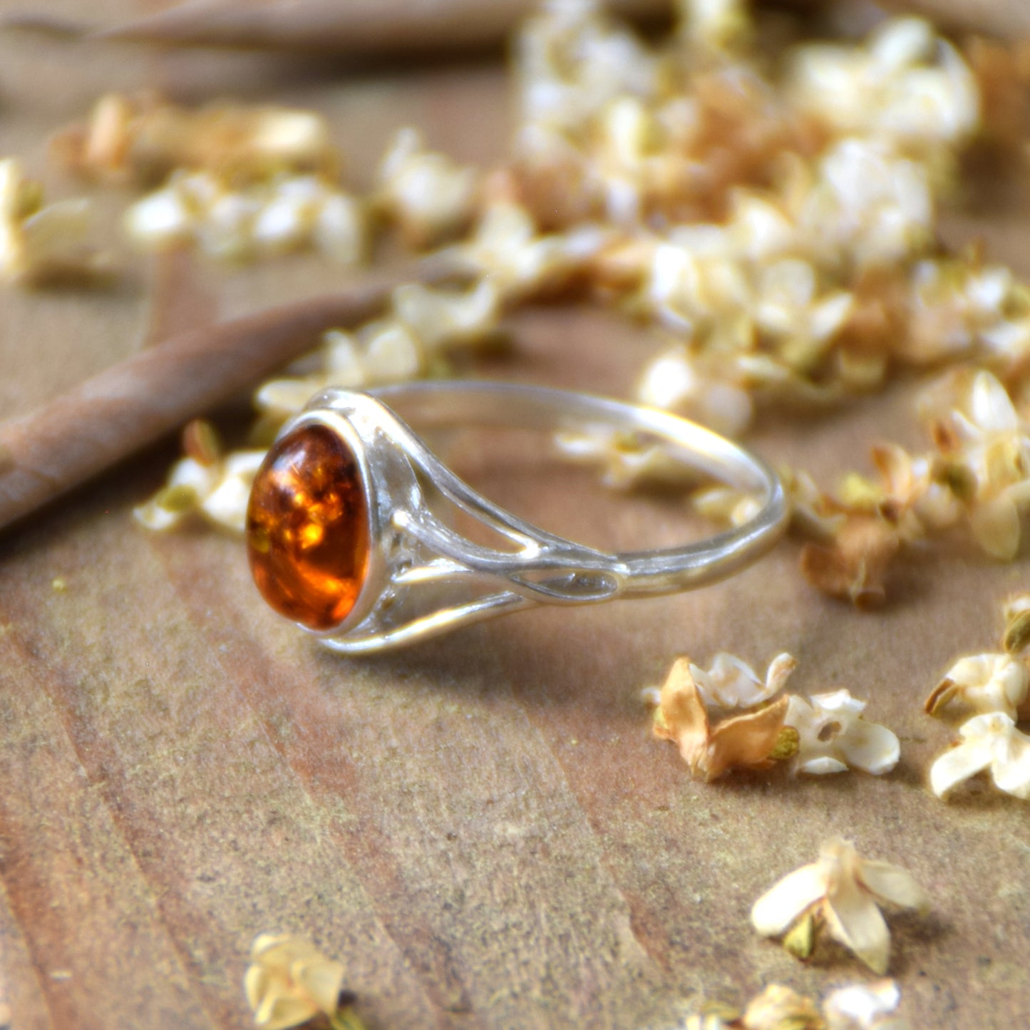 Delicate minimalist-style ring made with natural cognac-colored Amber and 925 Silver, MJ Baltica, BP096