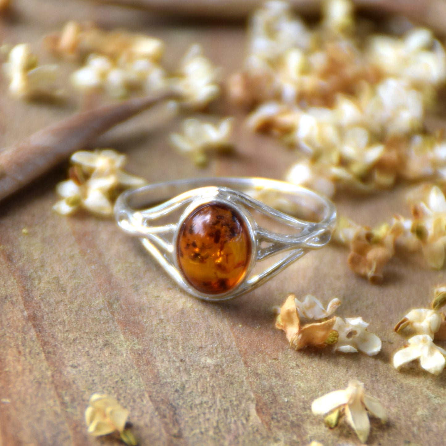 Delicate minimalist-style ring made with natural cognac-colored Amber and 925 Silver, MJ Baltica, BP096