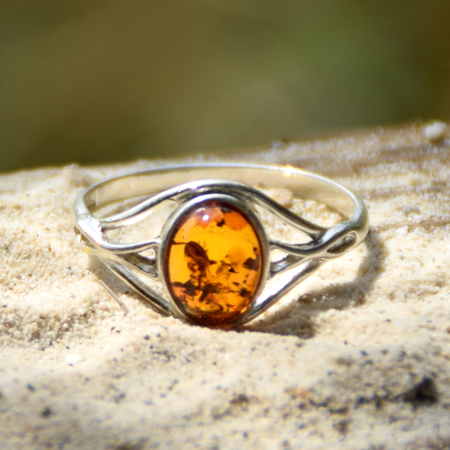 Delicate minimalist-style ring made with natural cognac-colored Amber and 925 Silver, MJ Baltica, BP096